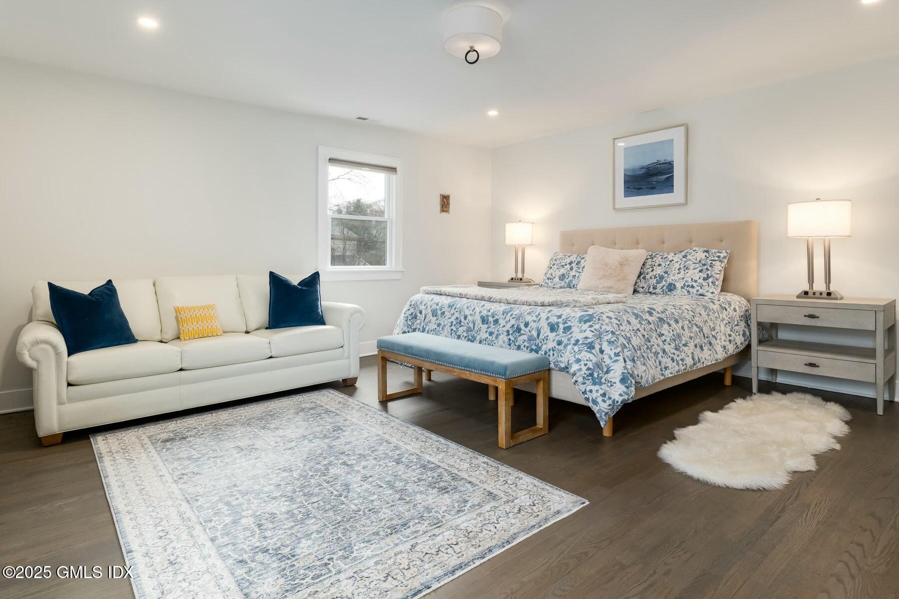 7 Griffith Road Riverside, CT 06878 - Photo 12 of 30 a bedroom with a bed and a couch