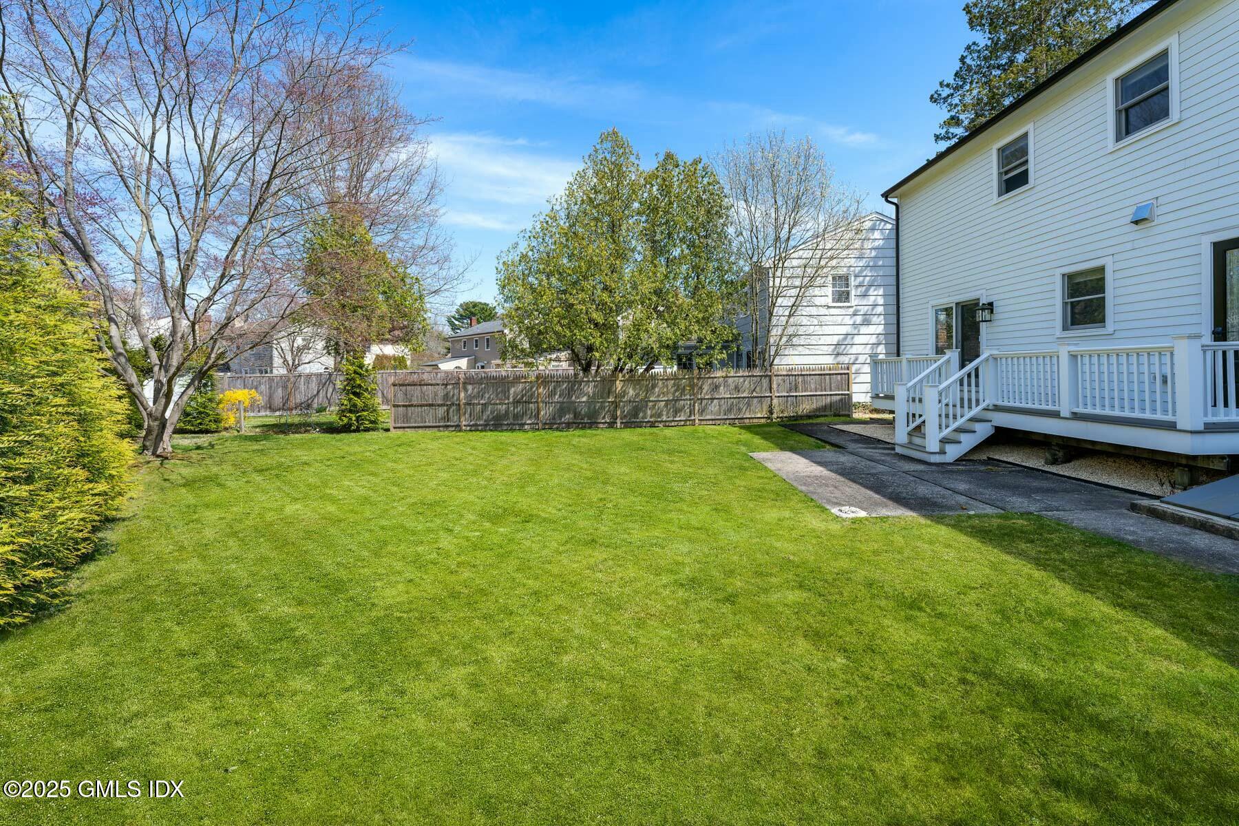 7 Griffith Road Riverside, CT 06878 - Photo 27 of 30 a view of a backyard with a house