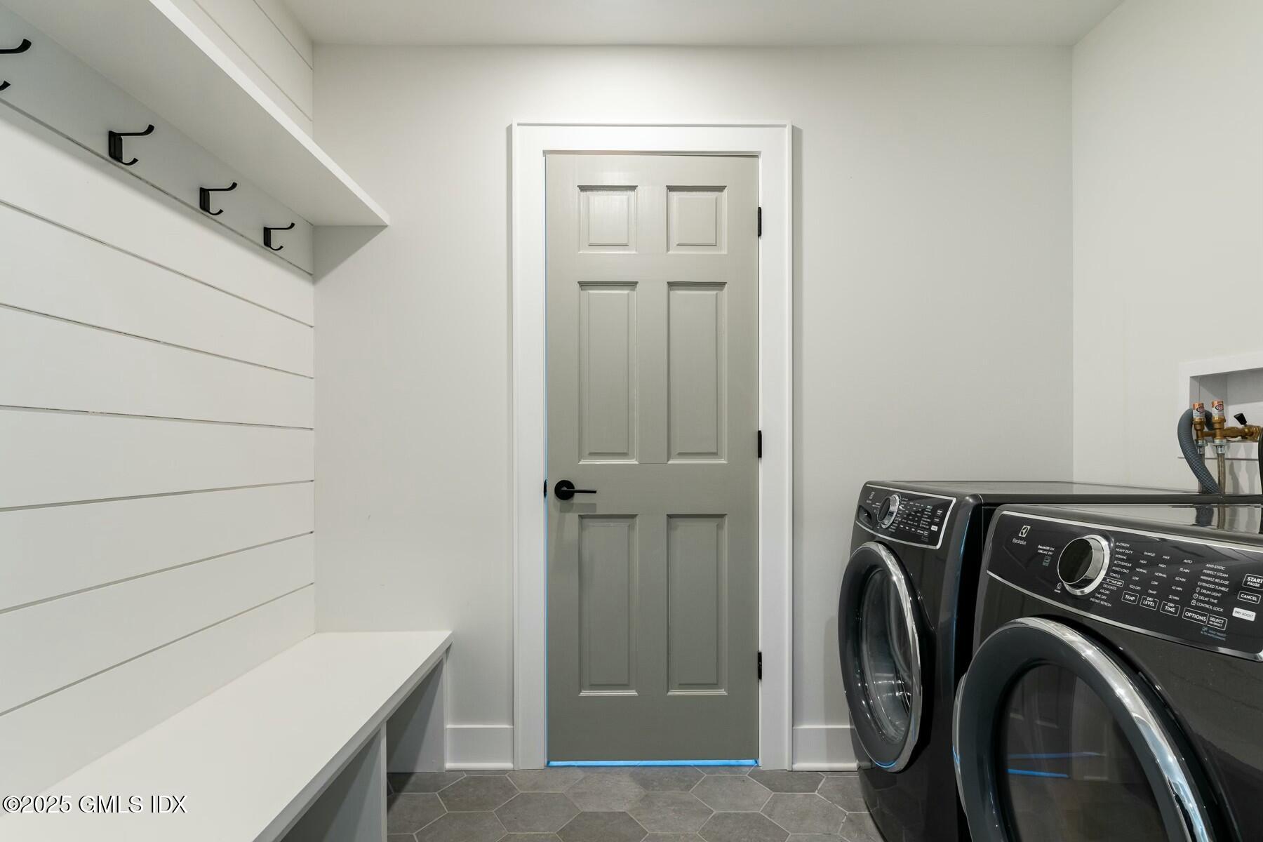 7 Griffith Road Riverside, CT 06878 - Photo 9 of 30 a view of storage and utility room with washer and dryer