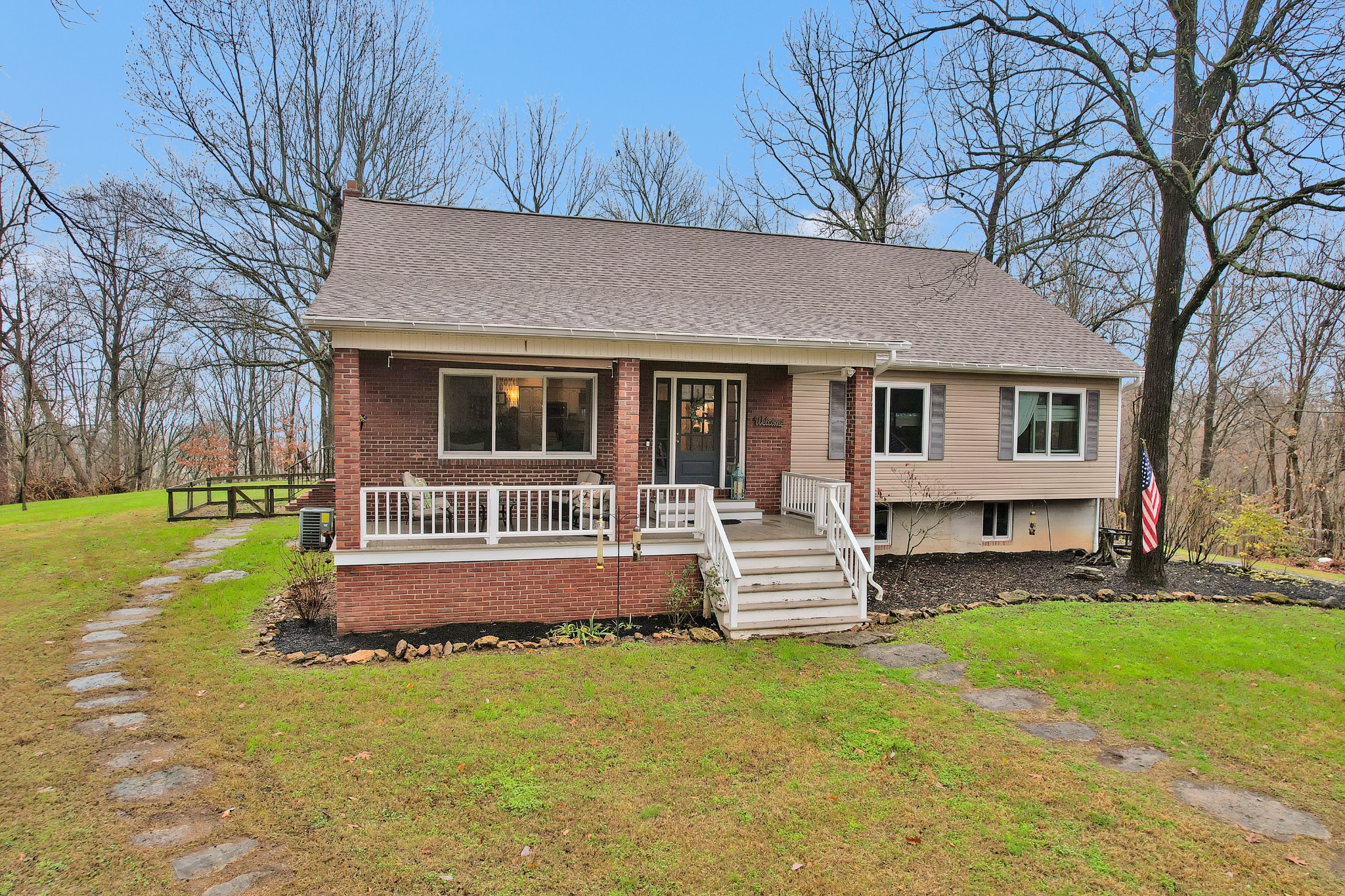 front view of a house with a yard