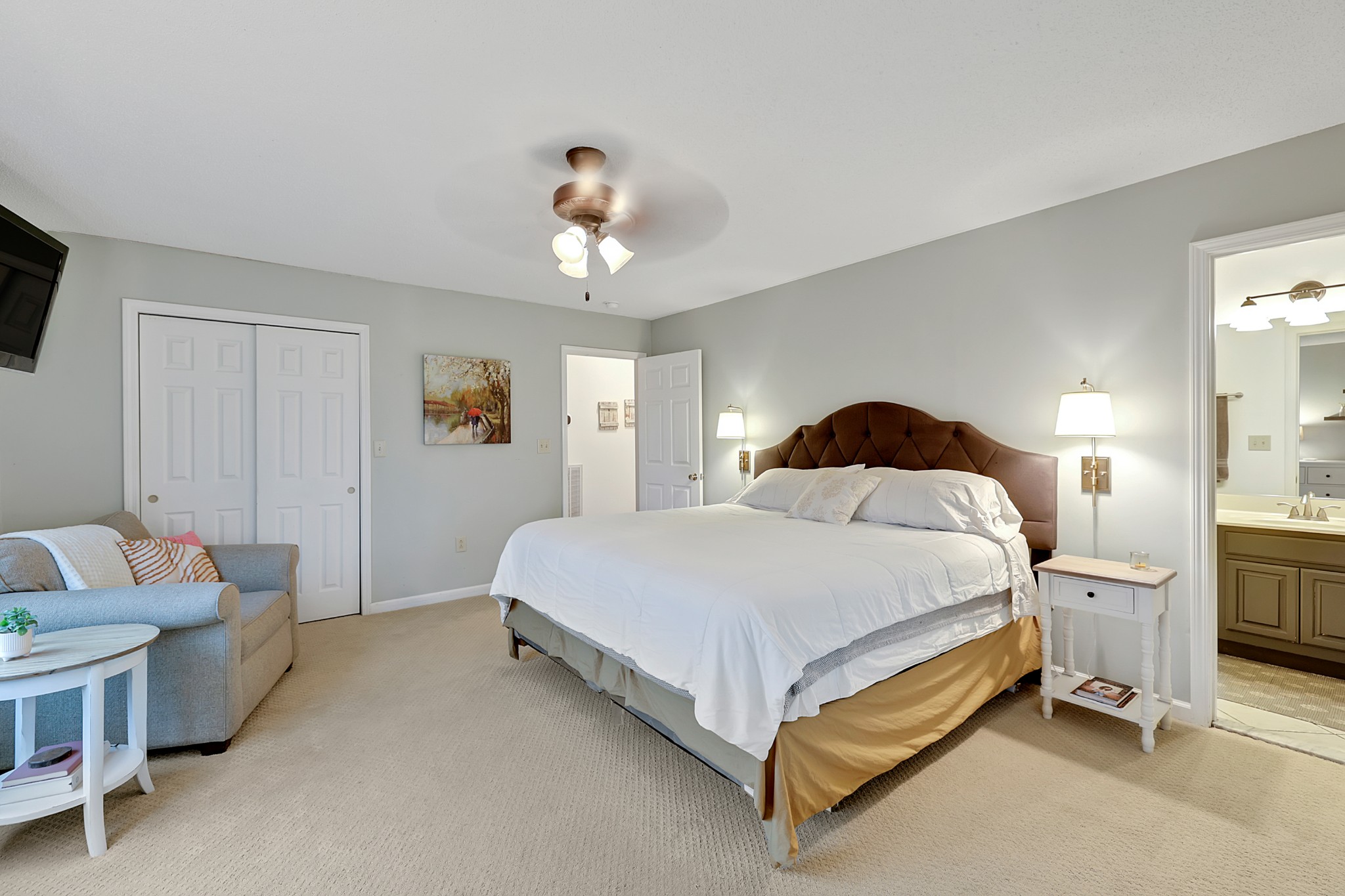 1820 Gravel Hill Road Columbia, TN 38401 - Photo 23 of 37 a spacious bedroom with a bed and a chandelier