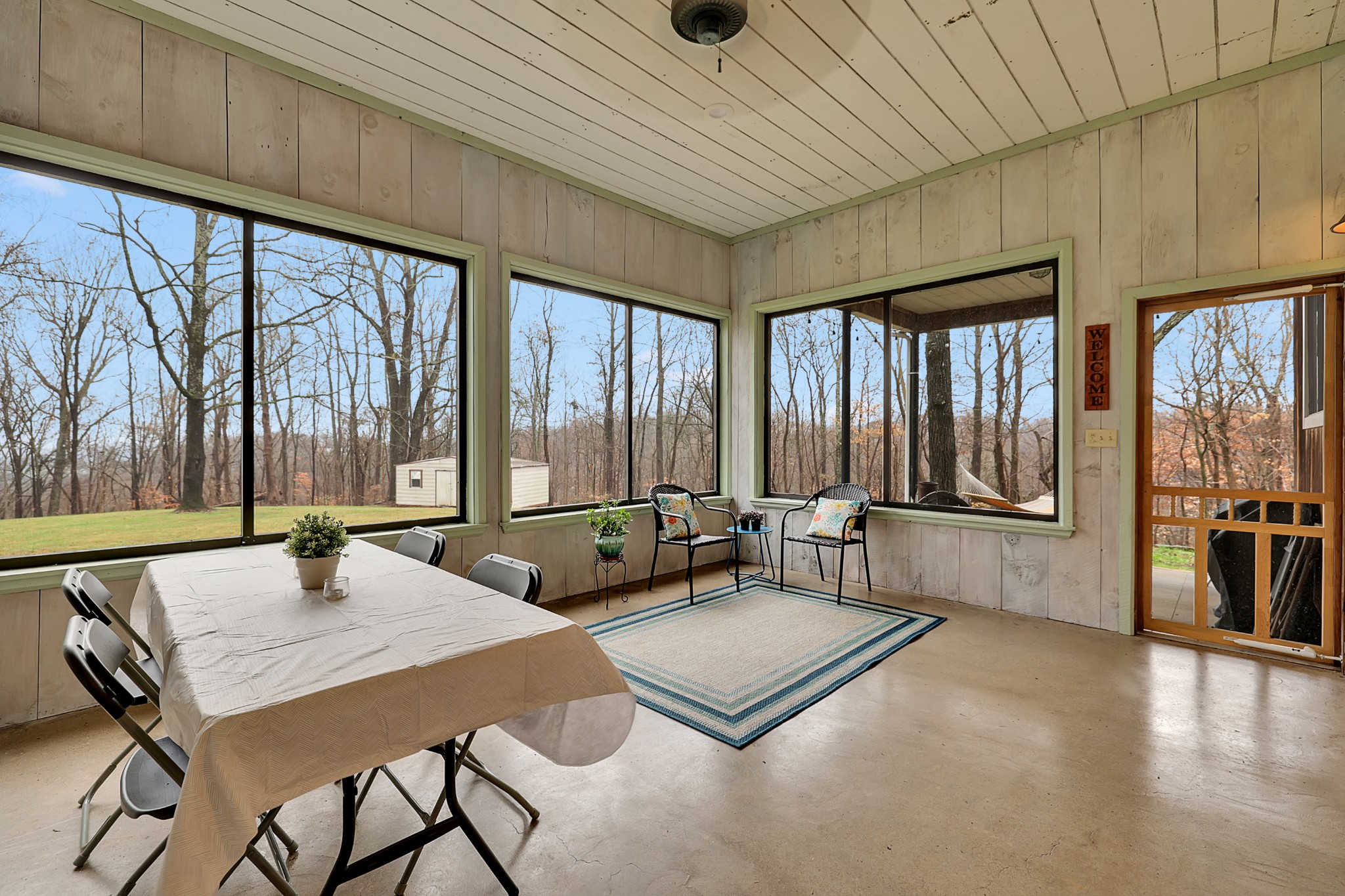 1820 Gravel Hill Road Columbia, TN 38401 - Photo 31 of 37 a living room with furniture large windows and wooden floor