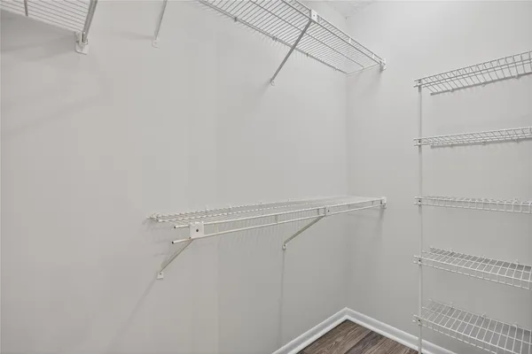 a view of a room with racks on the wall