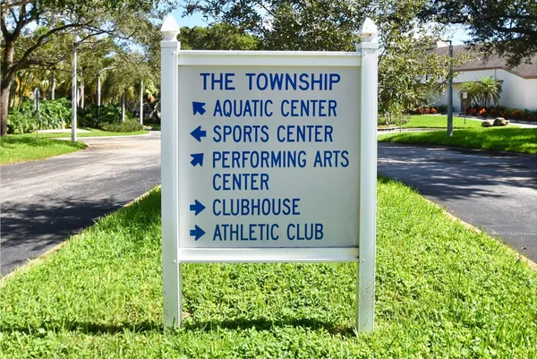 a sign on the side of the road