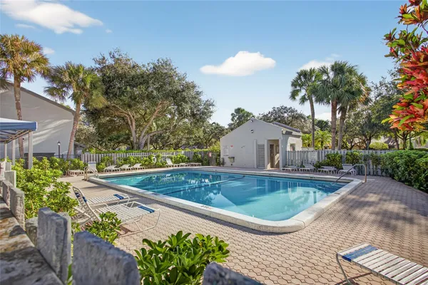 a front view of a house with swimming pool