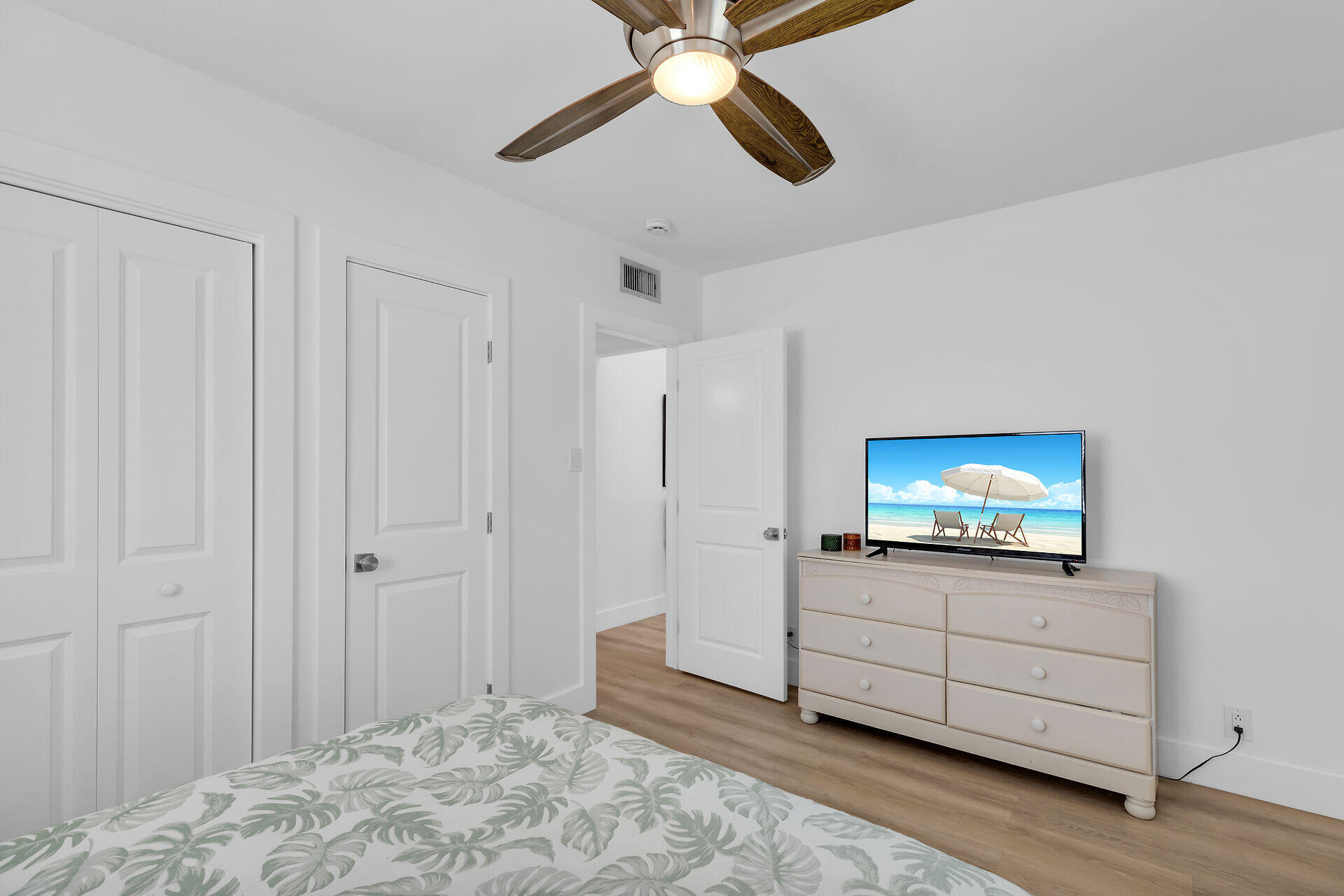 1440 17th Street Key West, FL 33040 - Photo 14 of 37 a room view with a bed and a flat screen tv