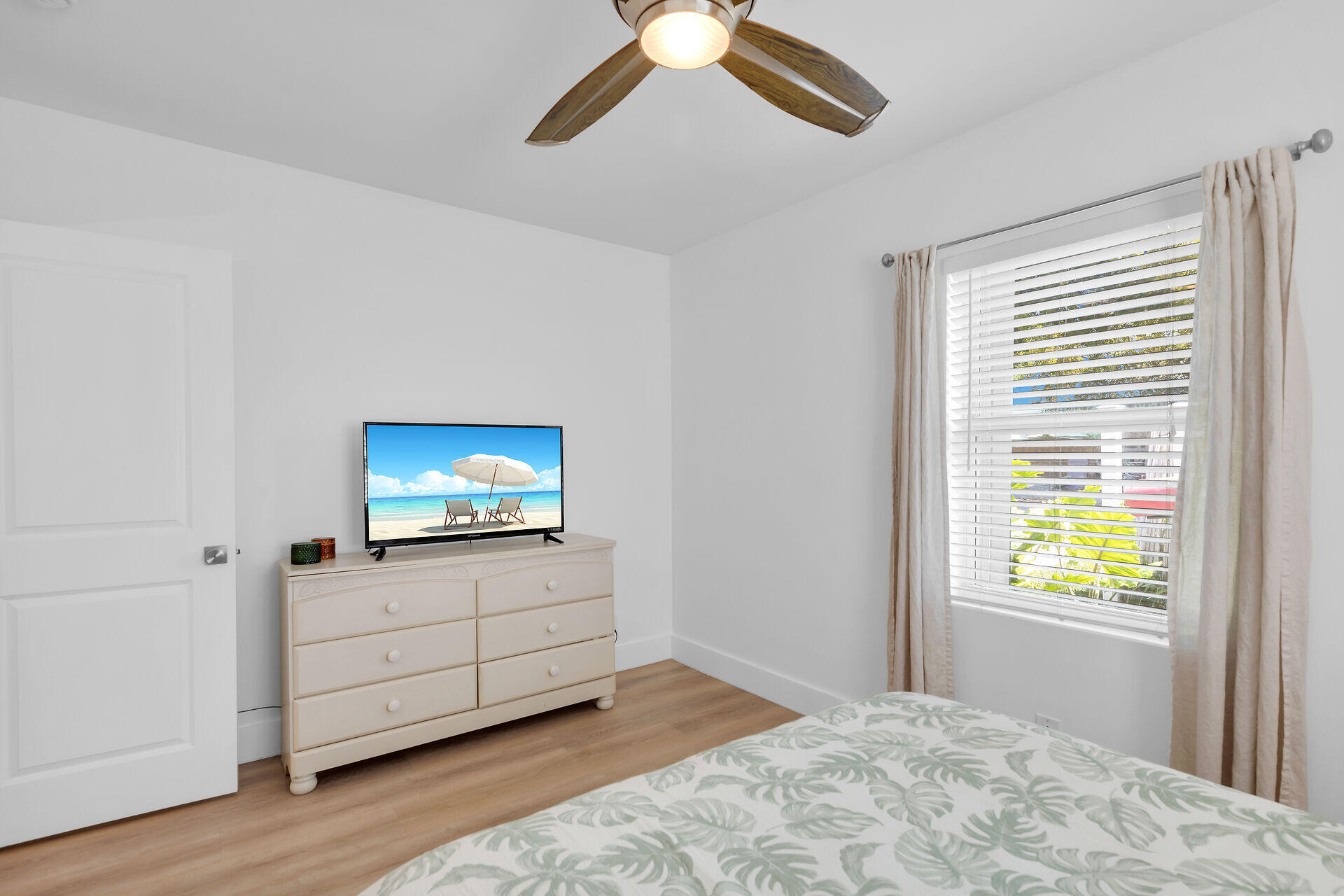 1440 17th Street Key West, FL 33040 - Photo 15 of 37 a bedroom with bed and window