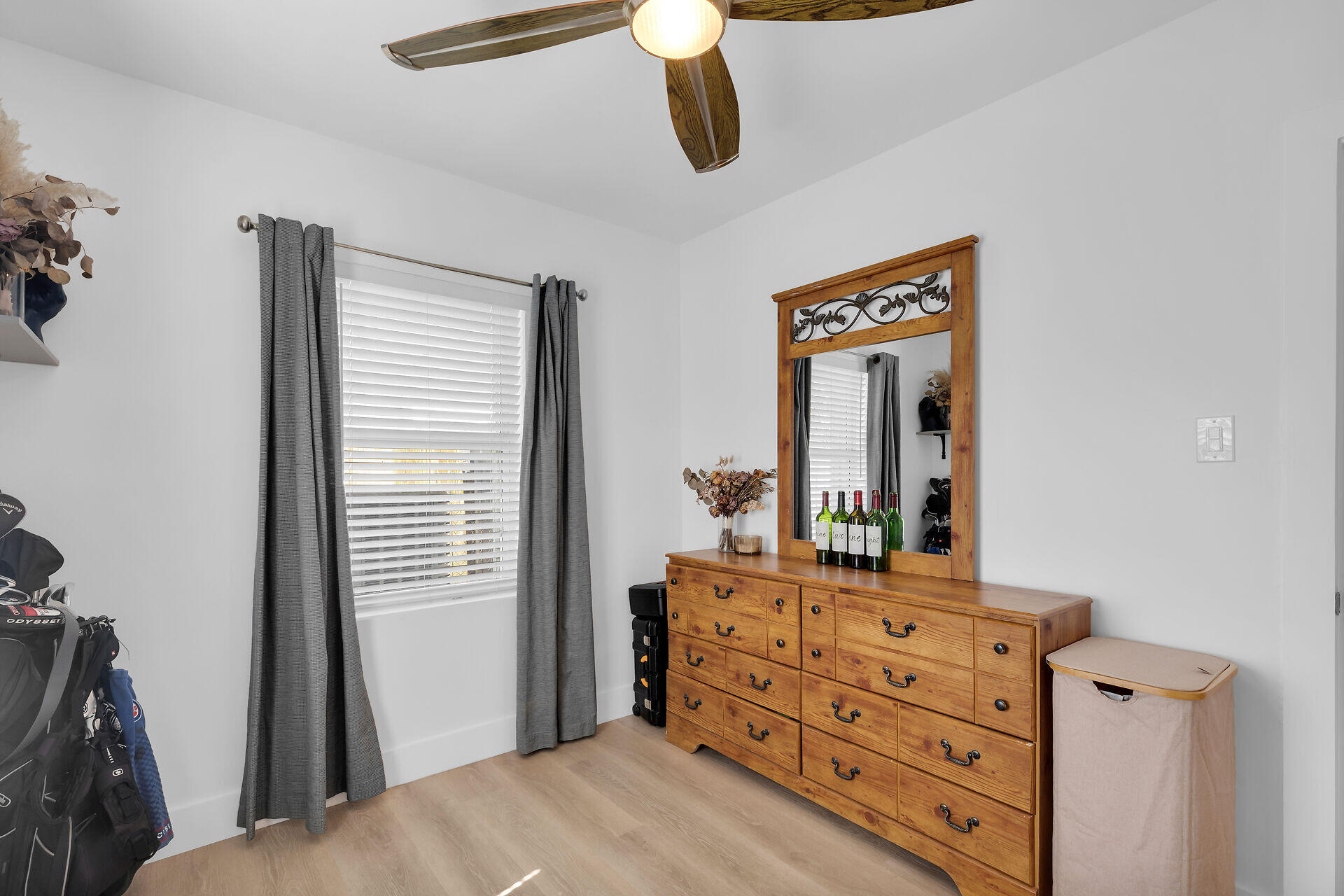 1440 17th Street Key West, FL 33040 - Photo 17 of 37 a bedroom with a bed and a mirror on dresser