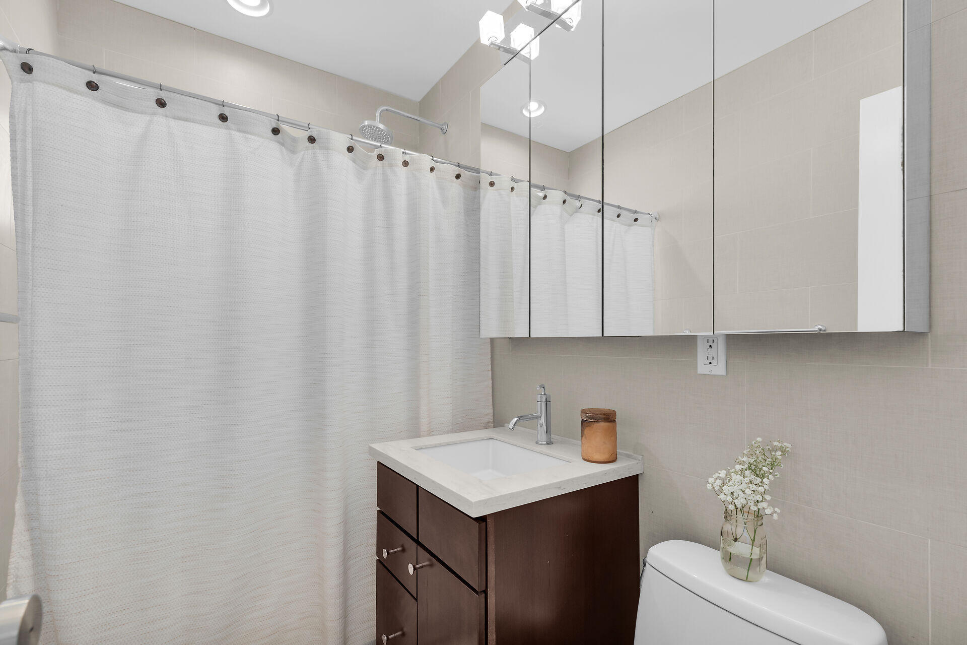 1440 17th Street Key West, FL 33040 - Photo 19 of 37 a bathroom with a sink a toilet and shower