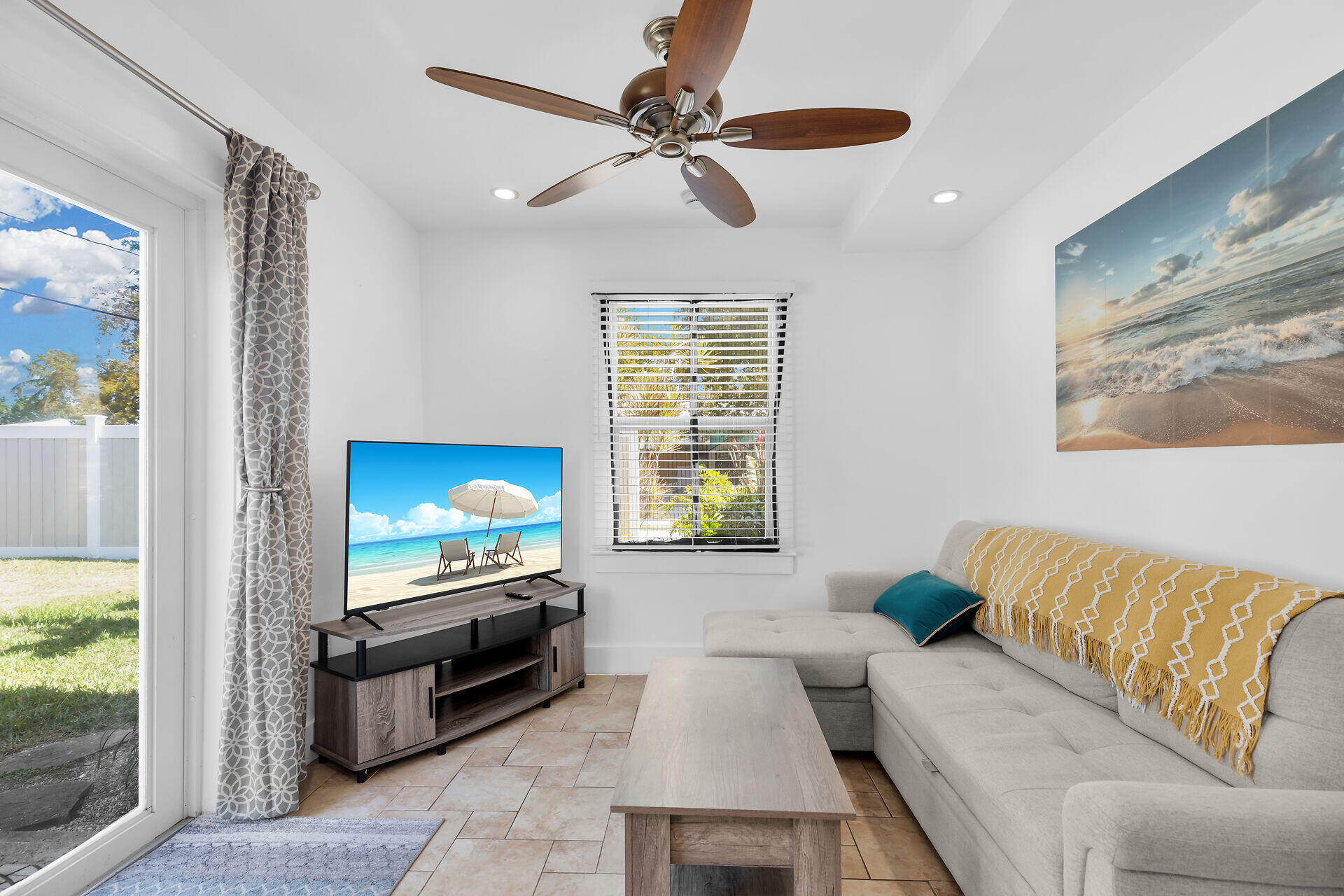 1440 17th Street Key West, FL 33040 - Photo 26 of 37 a living room with furniture and a flat screen tv