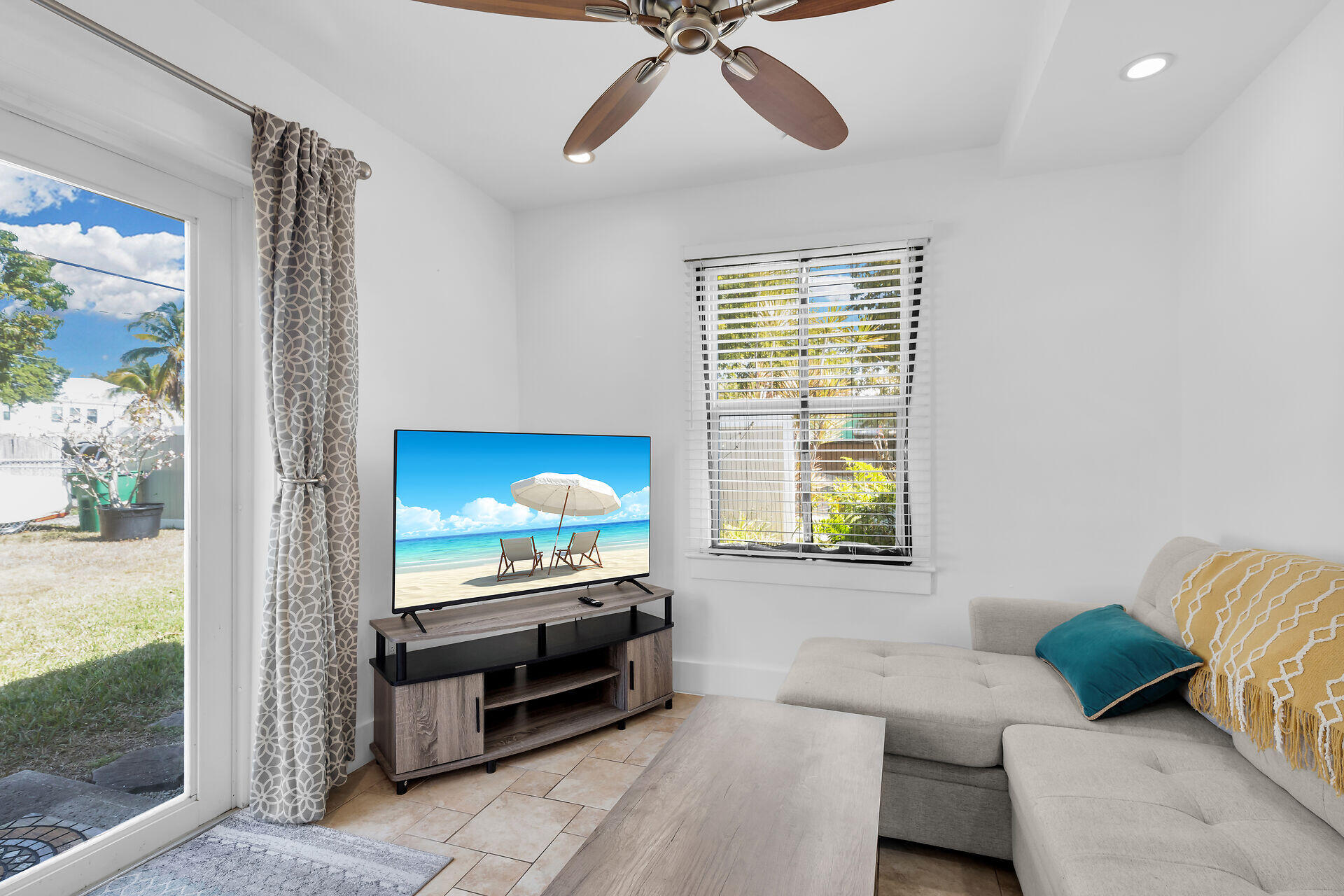 1440 17th Street Key West, FL 33040 - Photo 27 of 37 a living room with furniture and a flat screen tv