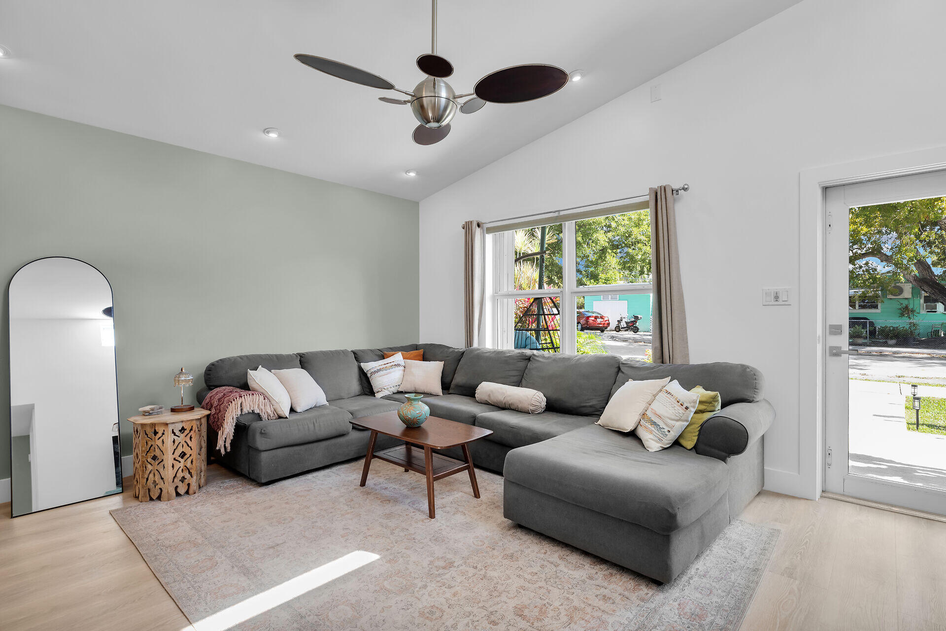 1440 17th Street Key West, FL 33040 - Photo 3 of 37 a living room with furniture and a large window