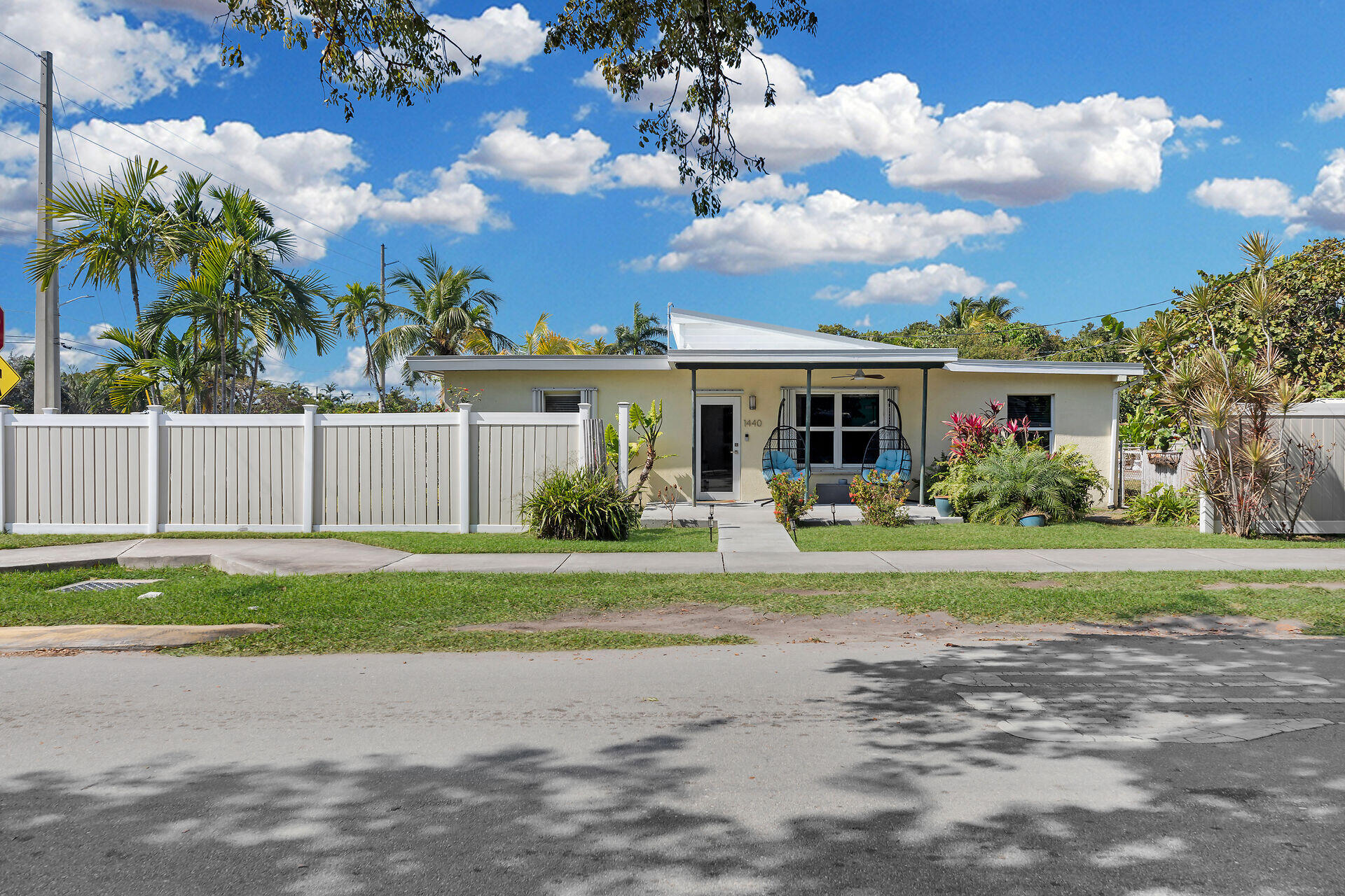 1440 17th Street Key West, FL 33040 - Photo 35 of 37 a front view of a house with a garden and yard