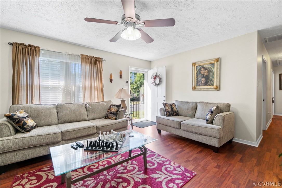 6209 Walderbrook Road Richmond, VA 23234 - Photo 2 of 35 a living room with furniture and a large window