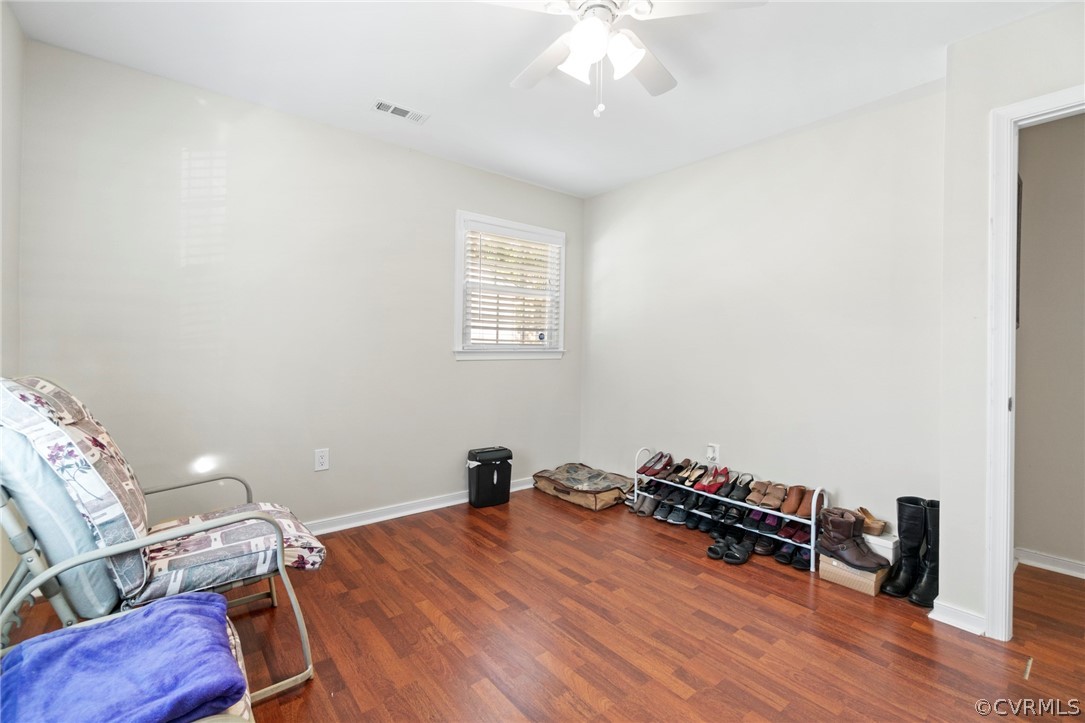 6209 Walderbrook Road Richmond, VA 23234 - Photo 24 of 35 a room with furniture and wooden floor
