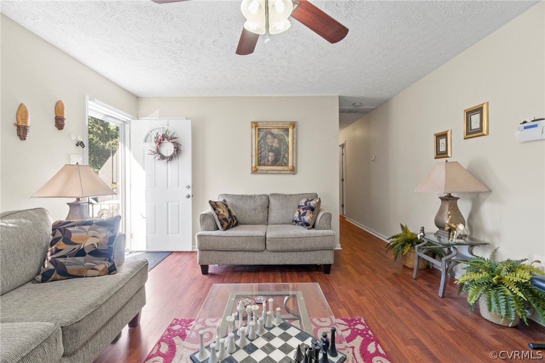 6209 Walderbrook Road Richmond, VA 23234 - Photo 8 of 35 a living room with furniture and a rug