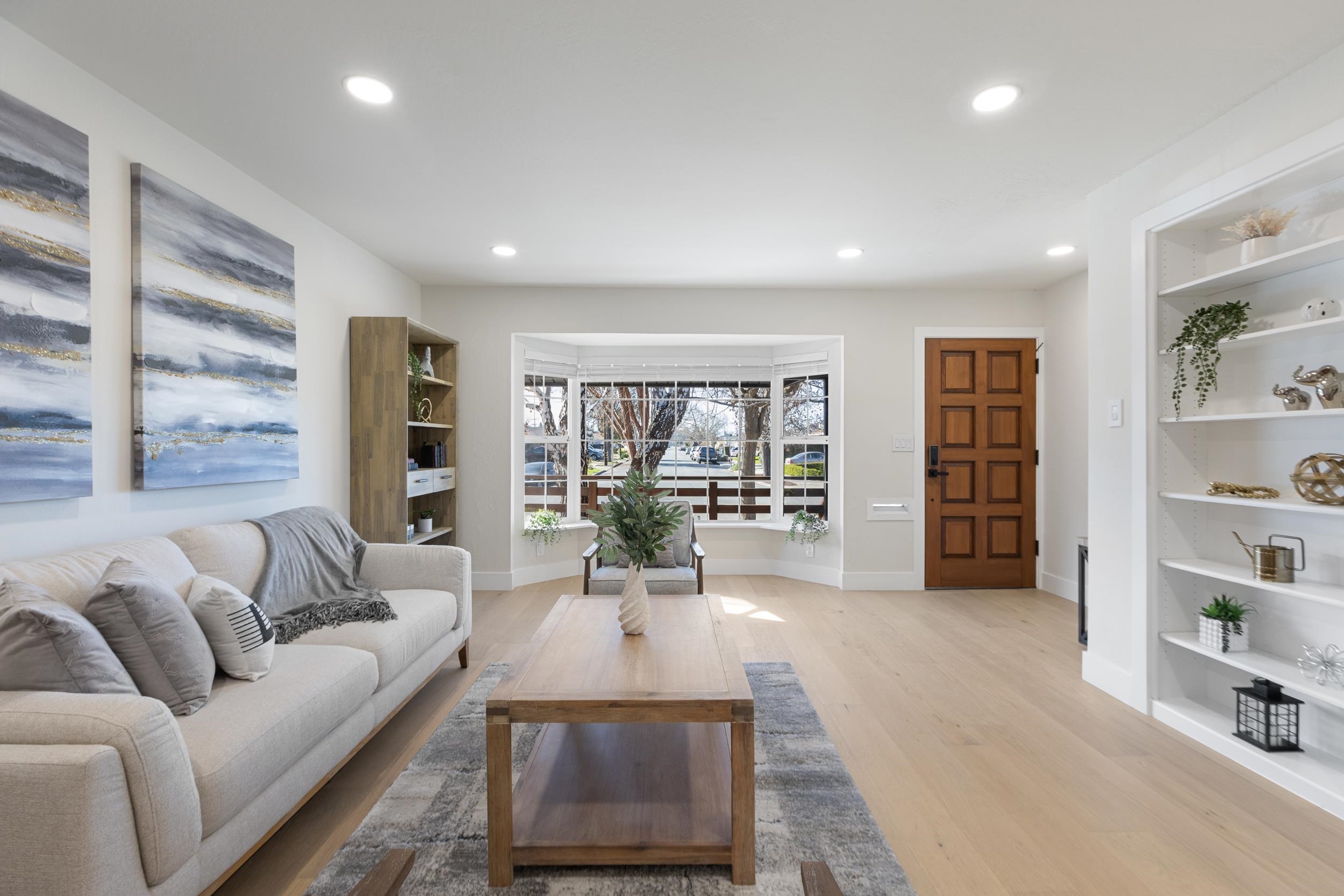 38952 Emrol Avenue Fremont, CA 94536 - Photo 11 of 59 a living room with furniture and a book shelf