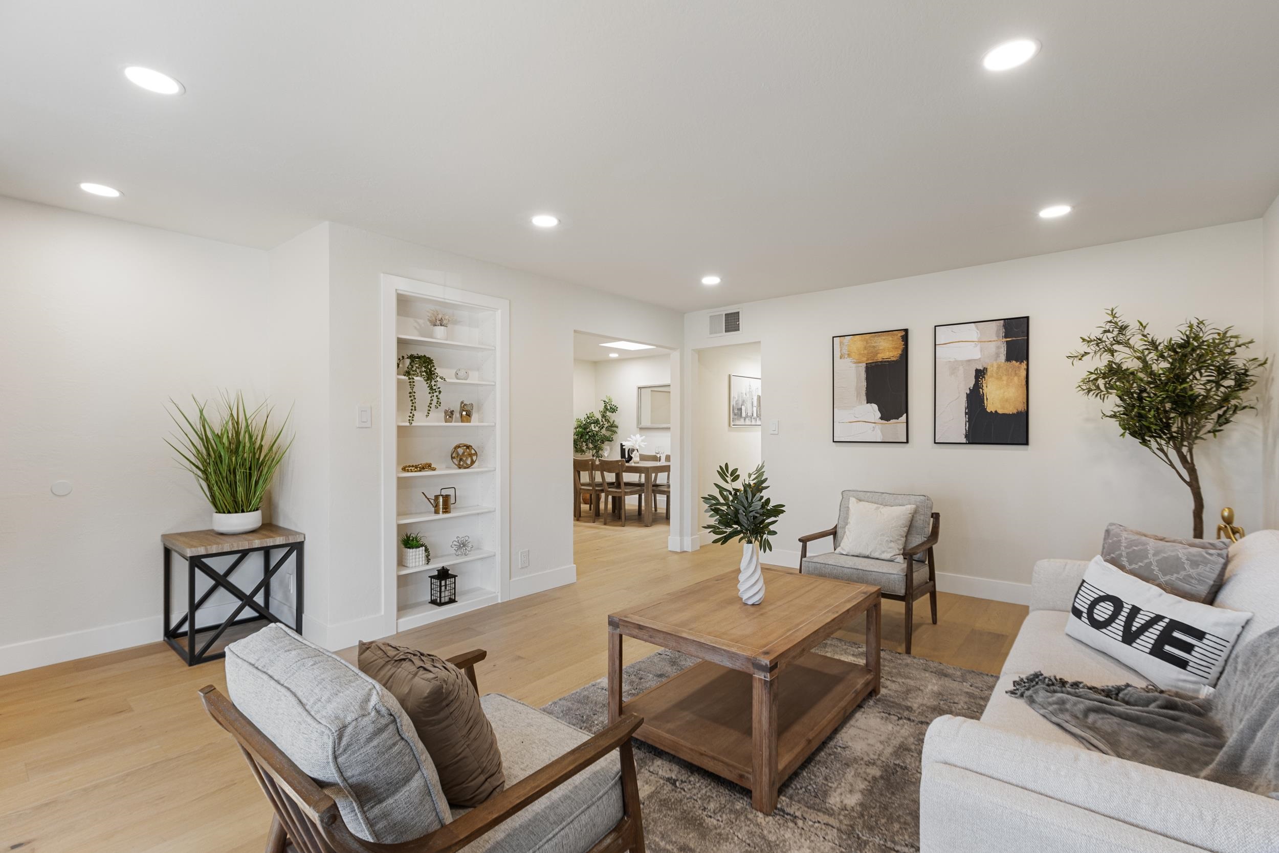 38952 Emrol Avenue Fremont, CA 94536 - Photo 13 of 59 a living room with furniture and a potted plant