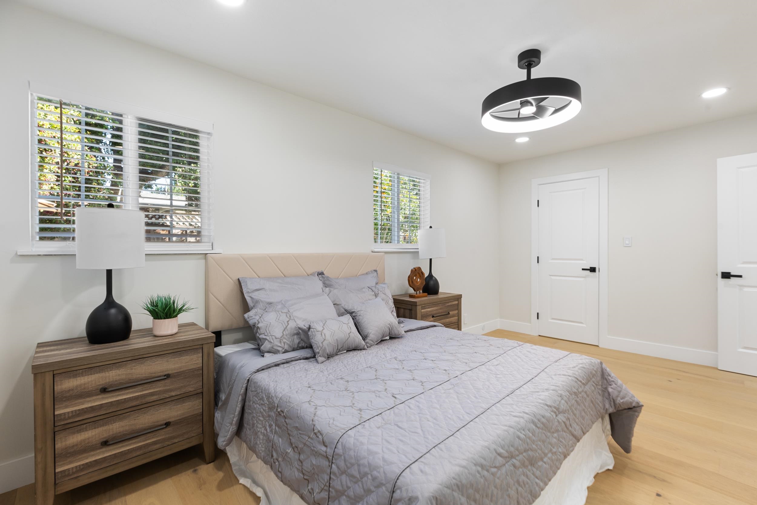 38952 Emrol Avenue Fremont, CA 94536 - Photo 26 of 59 a bedroom with a bed and a large window