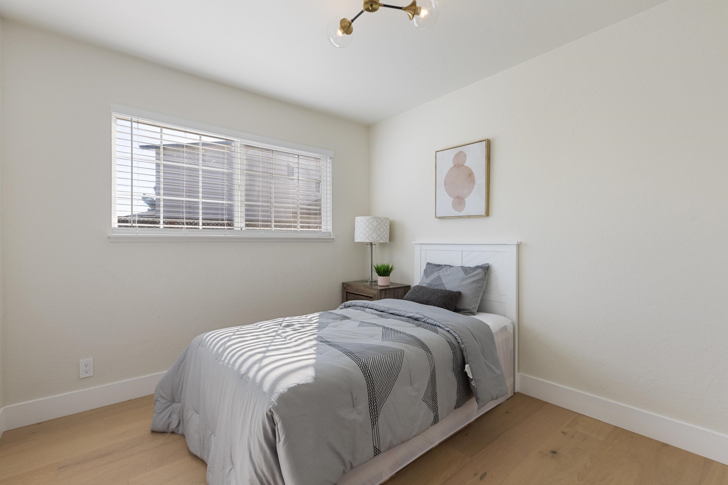 38952 Emrol Avenue Fremont, CA 94536 - Photo 31 of 59 a bedroom with a bed and a window