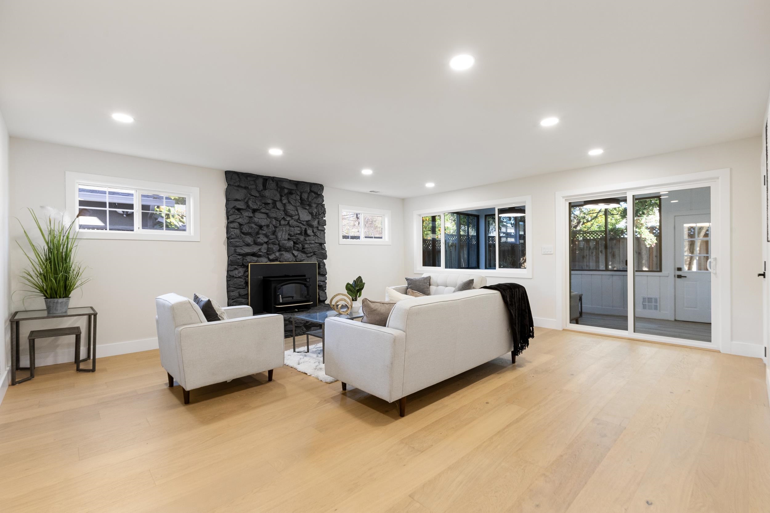 38952 Emrol Avenue Fremont, CA 94536 - Photo 33 of 59 a living room with furniture and a fireplace