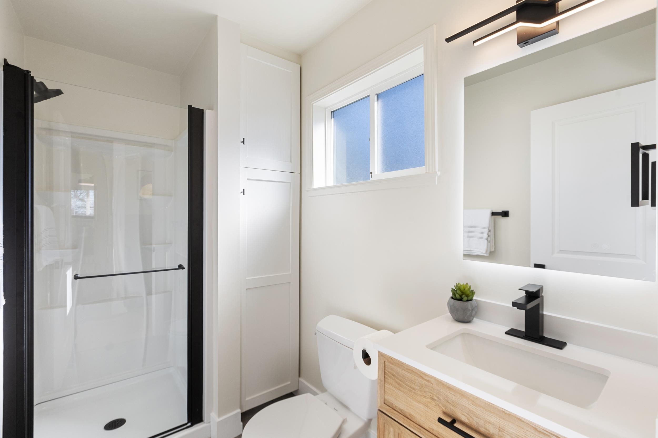 38952 Emrol Avenue Fremont, CA 94536 - Photo 42 of 59 a bathroom with a granite countertop sink toilet and shower