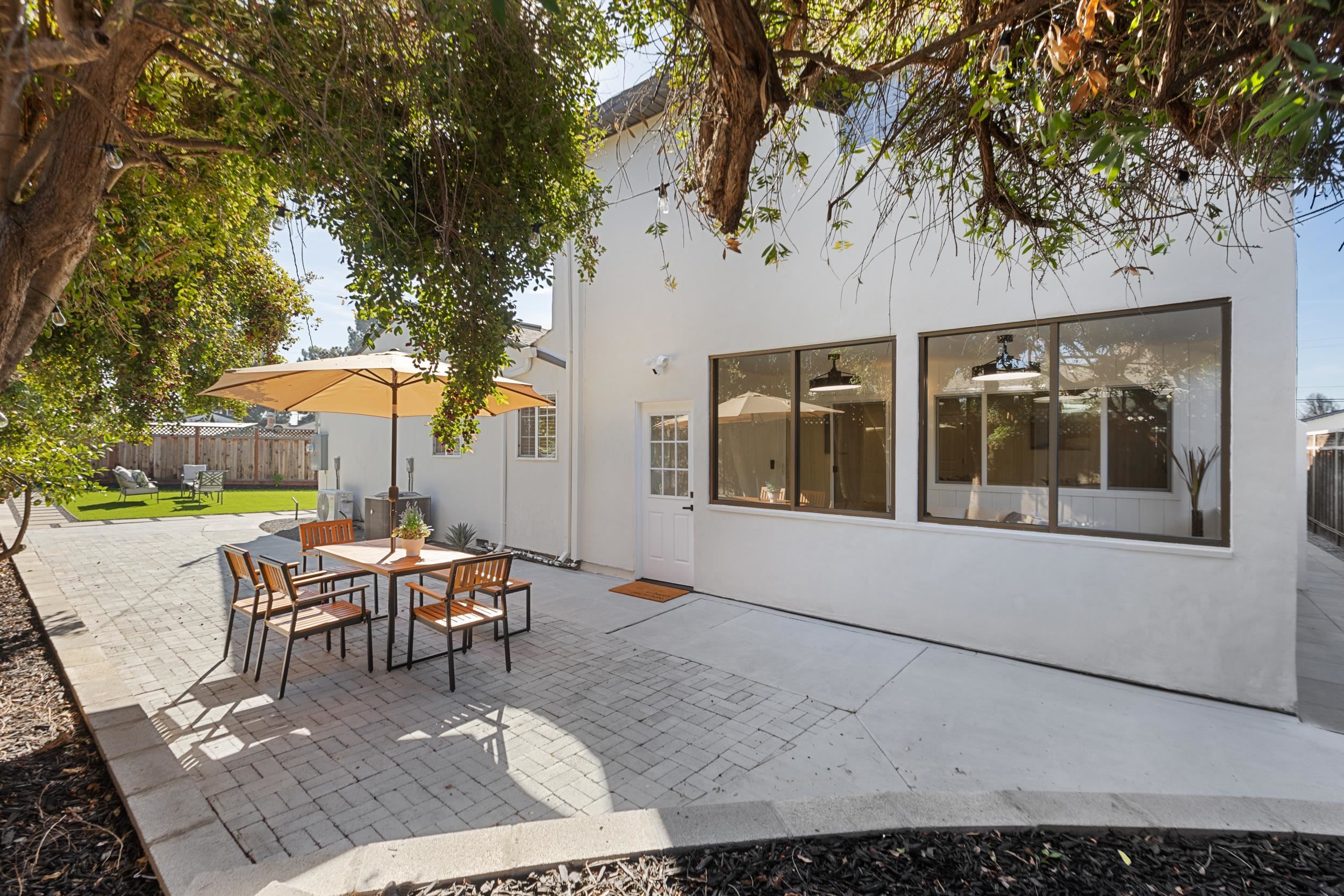 38952 Emrol Avenue Fremont, CA 94536 - Photo 49 of 59 a view of a house with backyard and sitting area