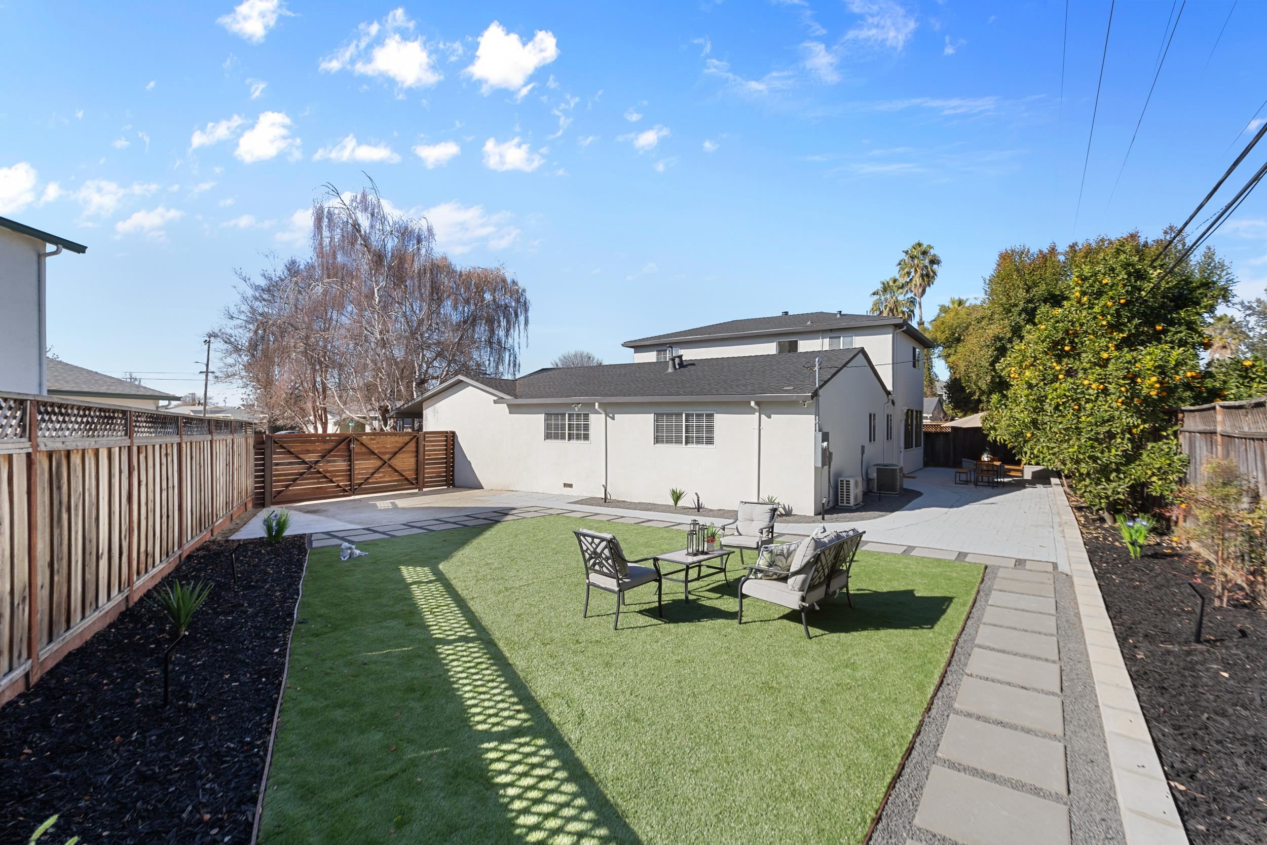 38952 Emrol Avenue Fremont, CA 94536 - Photo 53 of 59 a view of a house with backyard sitting area and garden