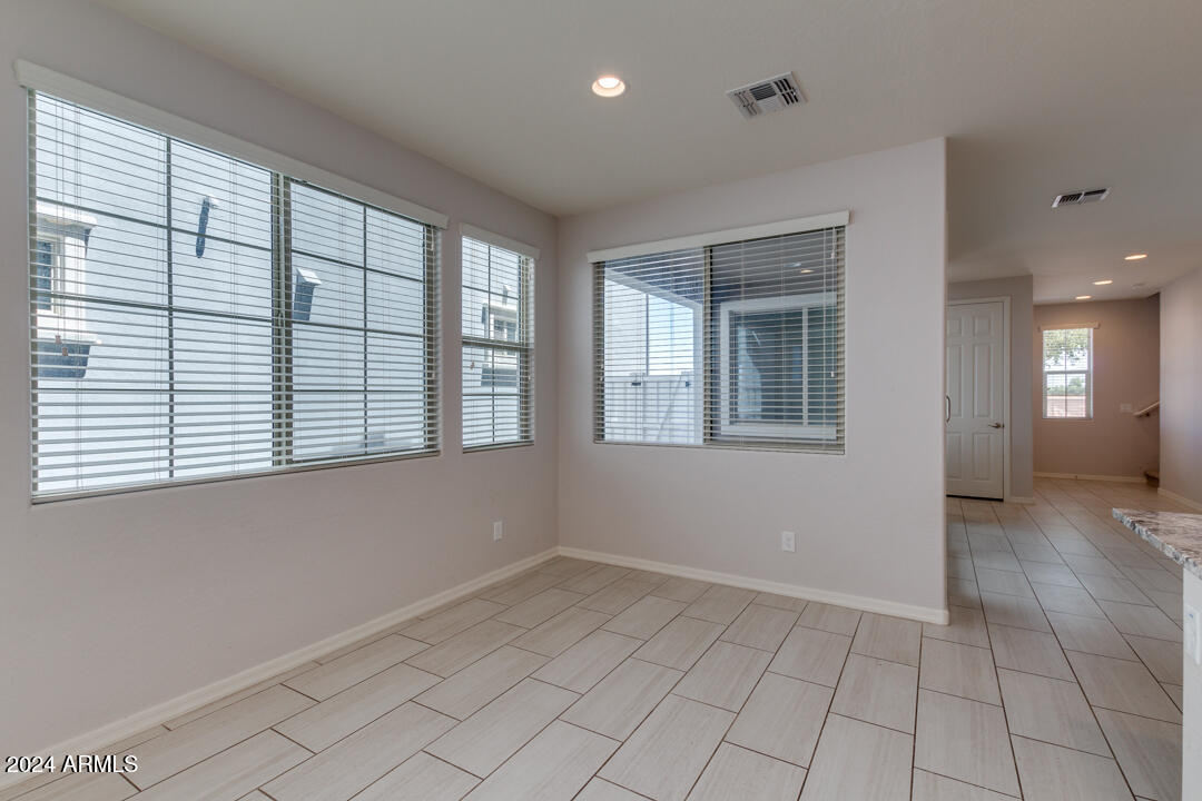 3661 East STILES Lane Gilbert, AZ 85295 - Photo 11 of 38 a view of an empty room with a window