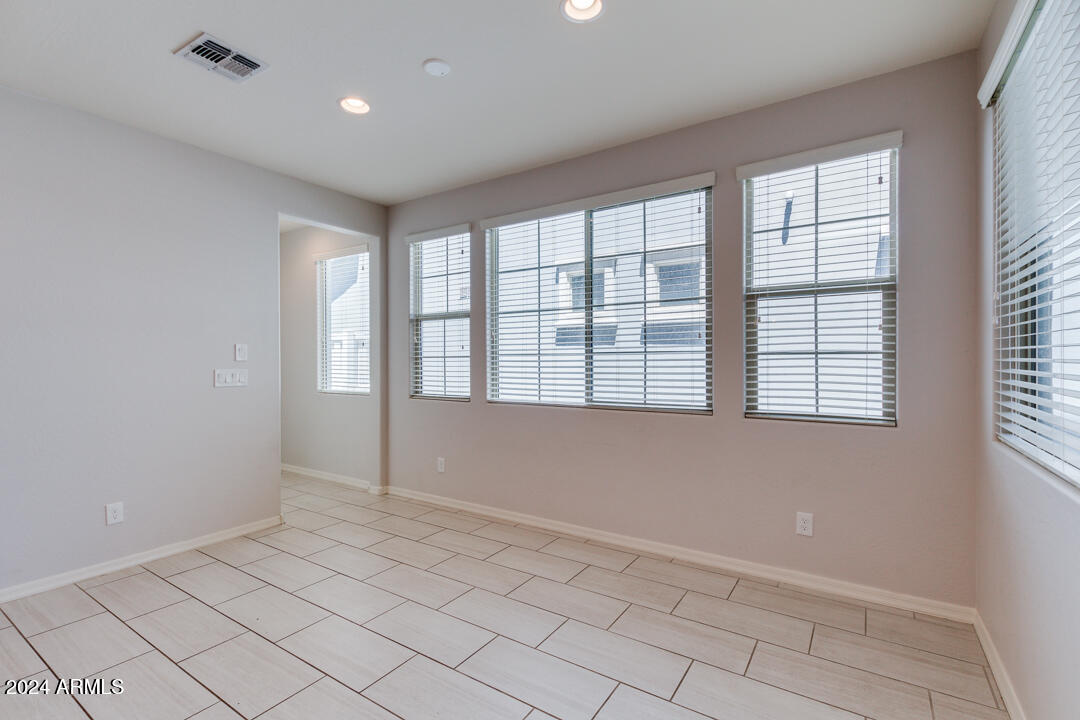 3661 East STILES Lane Gilbert, AZ 85295 - Photo 12 of 38 a view of an empty room with a window