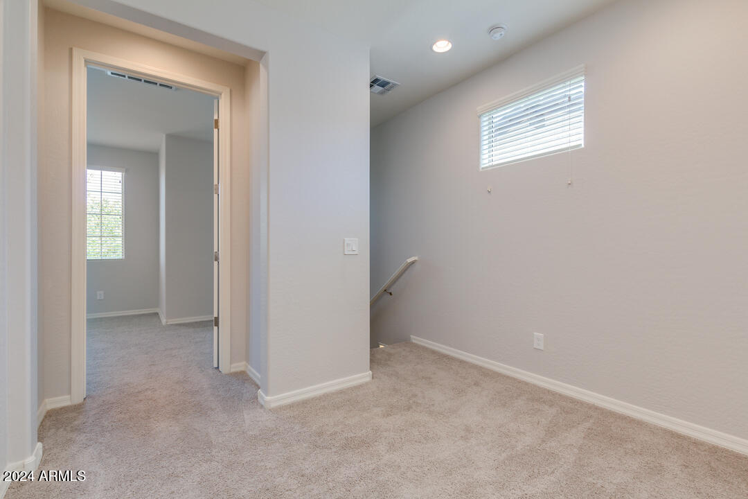 3661 East STILES Lane Gilbert, AZ 85295 - Photo 15 of 38 an empty room with windows and closet