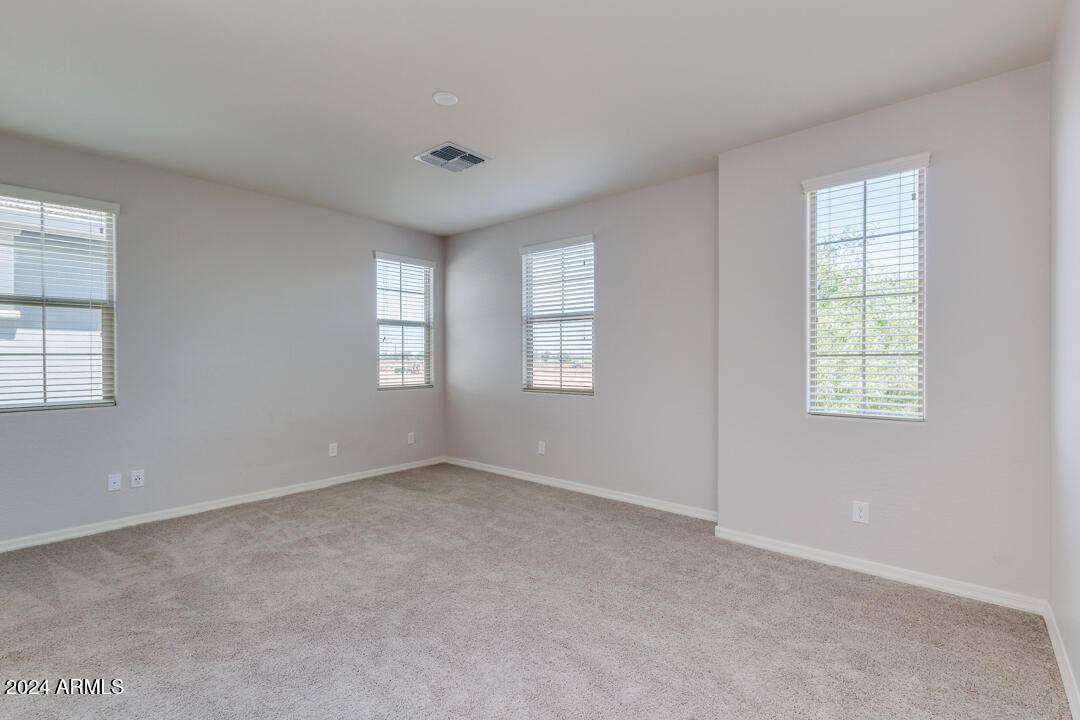 3661 East STILES Lane Gilbert, AZ 85295 - Photo 17 of 38 an empty room with windows
