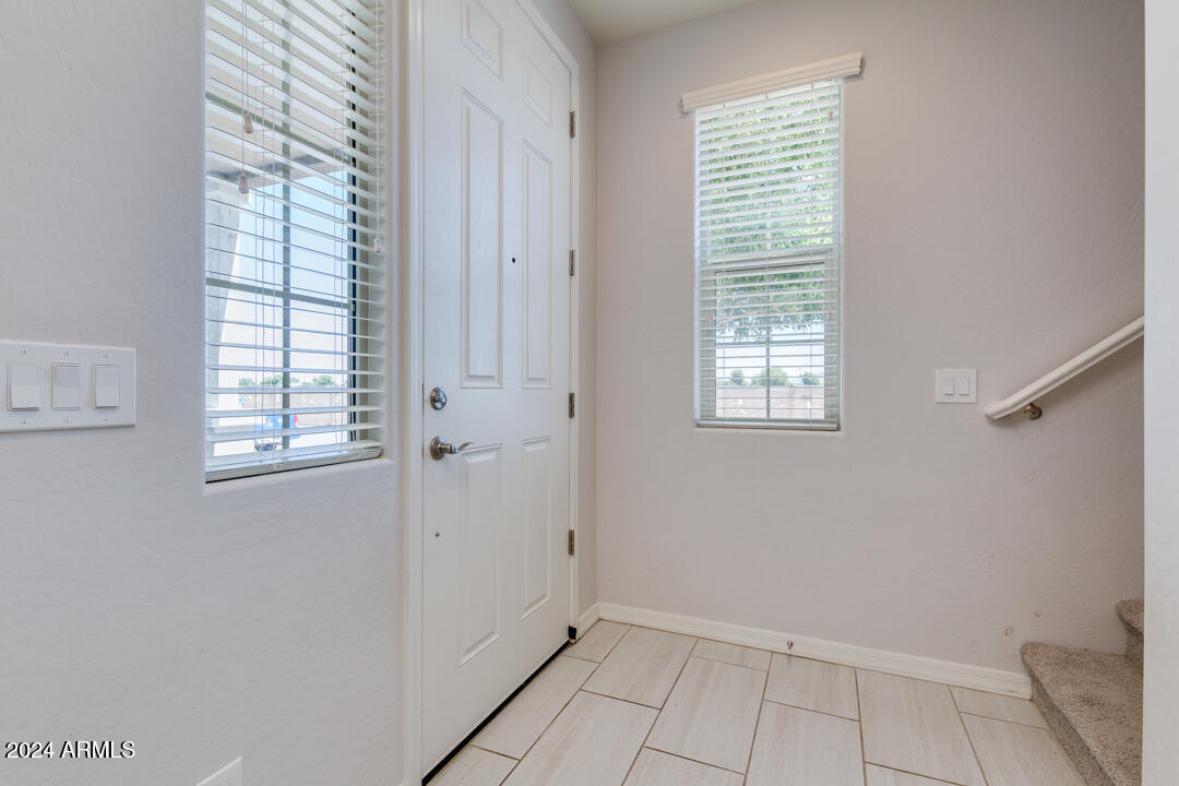 3661 East STILES Lane Gilbert, AZ 85295 - Photo 4 of 38 a view of an empty room with a window