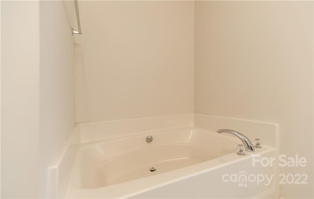 1904 Travertine Lane Fort Mill, SC 29708 - Photo 30 of 45 a bathroom with a bathtub