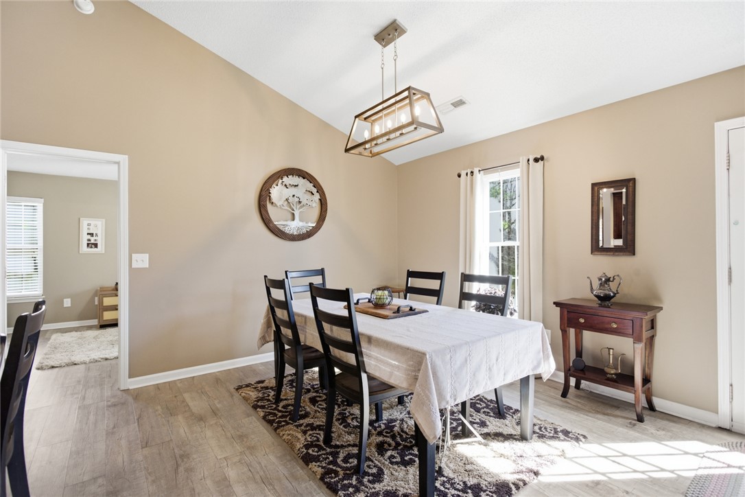158 State Rd S-37-175 Seneca, SC 29672 - Photo 12 of 43 This dining room offers an inviting atmosphere, perfect for gatherings and everyday meals.