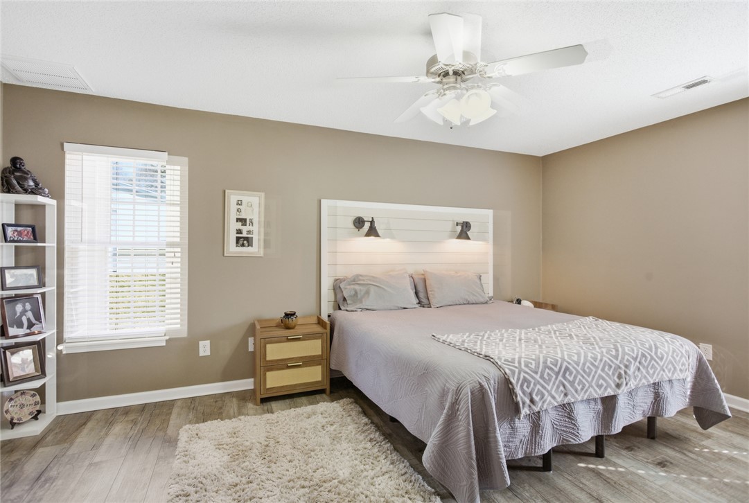 158 State Rd S-37-175 Seneca, SC 29672 - Photo 15 of 43 This serene sleeping area offers comfort and style with durable flooring.