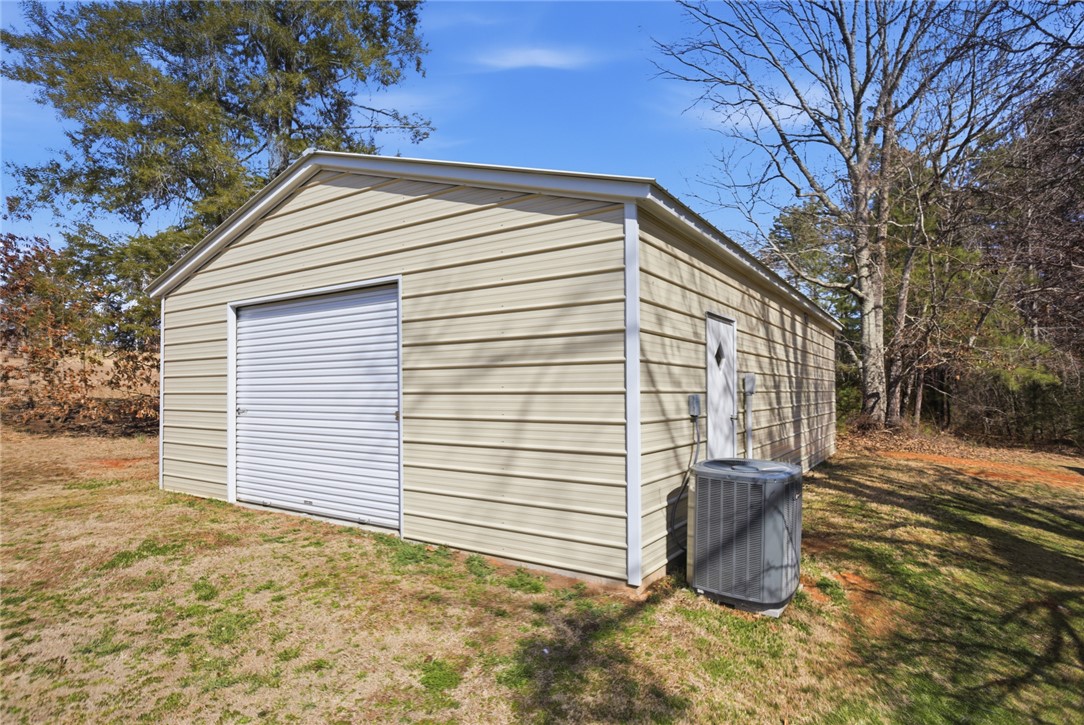 158 State Rd S-37-175 Seneca, SC 29672 - Photo 27 of 43 This outdoor storage facility offers ample space for vehicles and equipment.