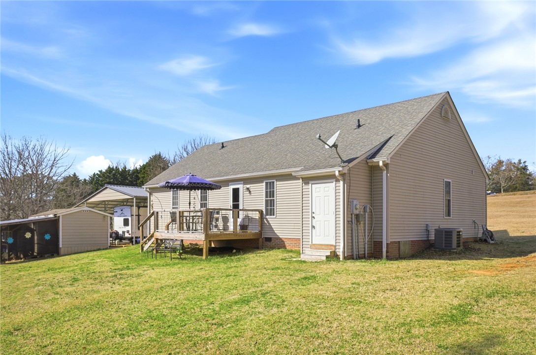 158 State Rd S-37-175 Seneca, SC 29672 - Photo 35 of 43 This charming home offers a spacious deck for outdoor living and ample yard space.