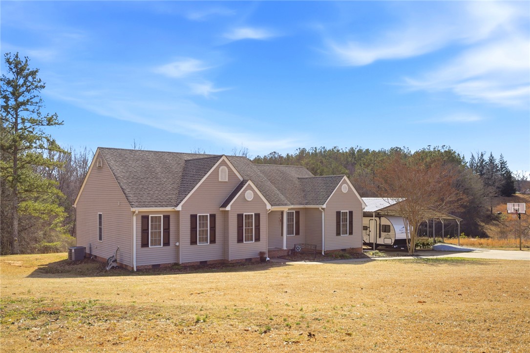 158 State Rd S-37-175 Seneca, SC 29672 - Photo 39 of 43 This charming residence features a well-maintained exterior and a spacious yard for outdoor enjoyment.