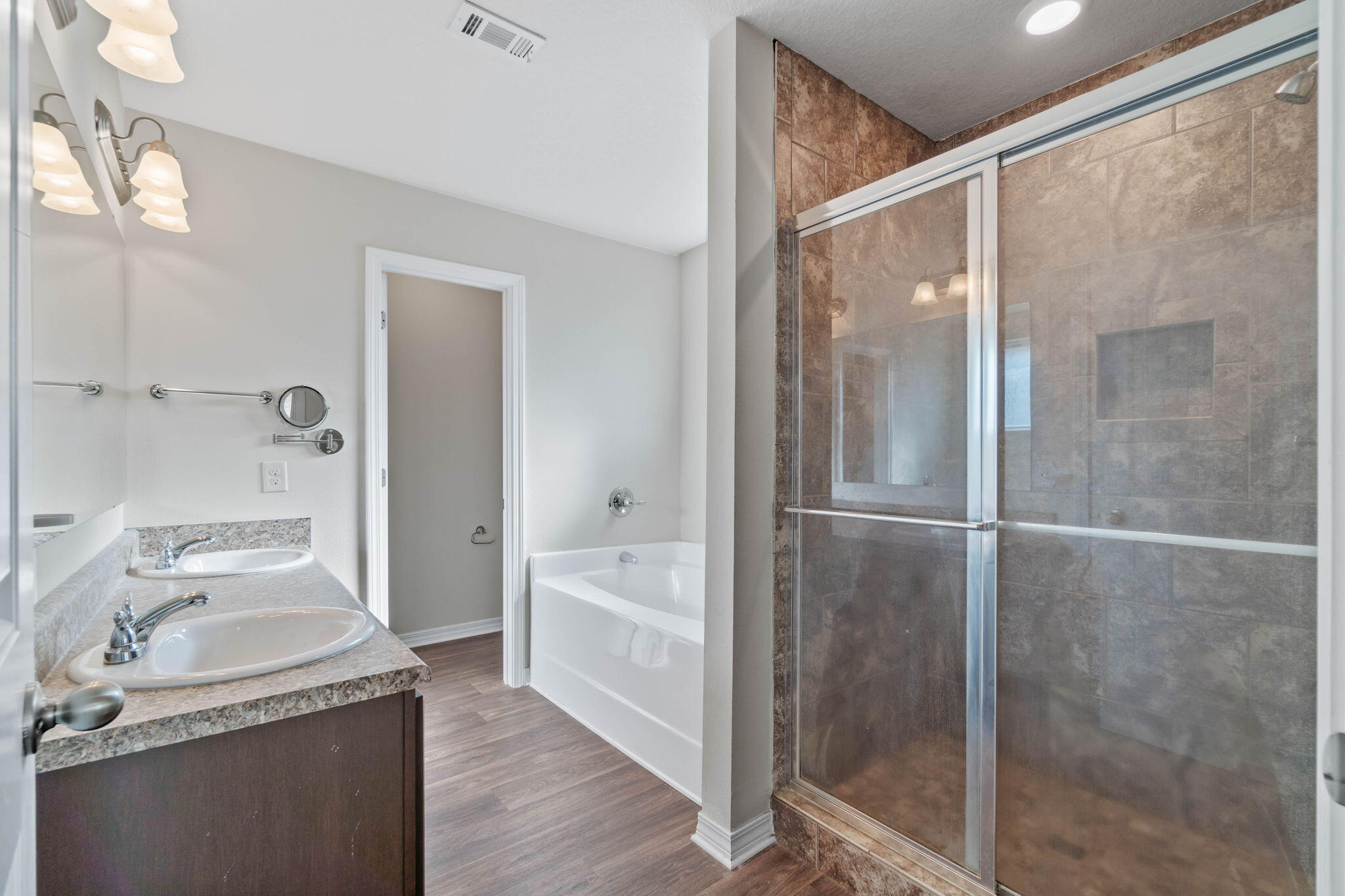 229 Croft Circle Crestview, FL 32536 - Photo 13 of 22 a bathroom with a granite countertop sink toilet and shower