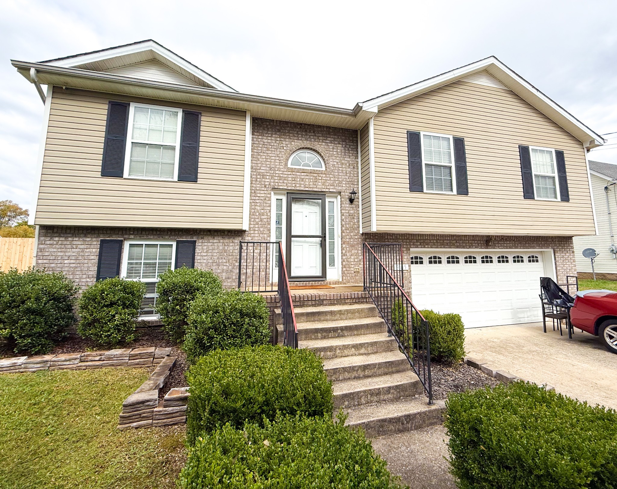 985 Silty Drive Clarksville, TN 37042 - Photo 1 of 19 a front view of a house with a yard