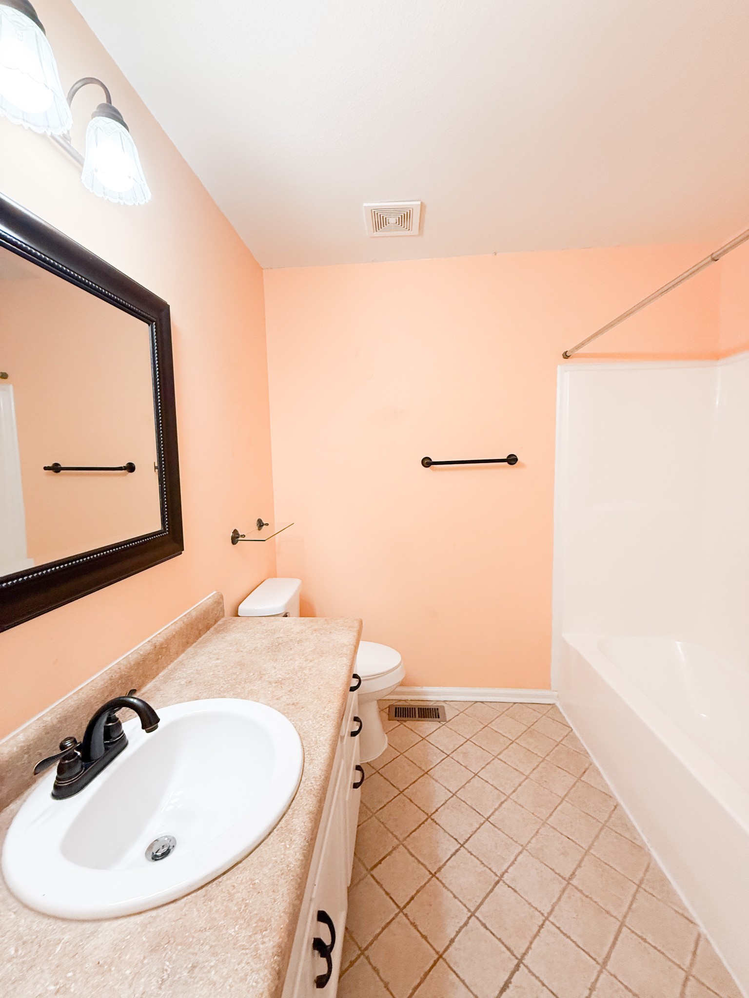 985 Silty Drive Clarksville, TN 37042 - Photo 14 of 19 a bathroom with a sink and a mirror