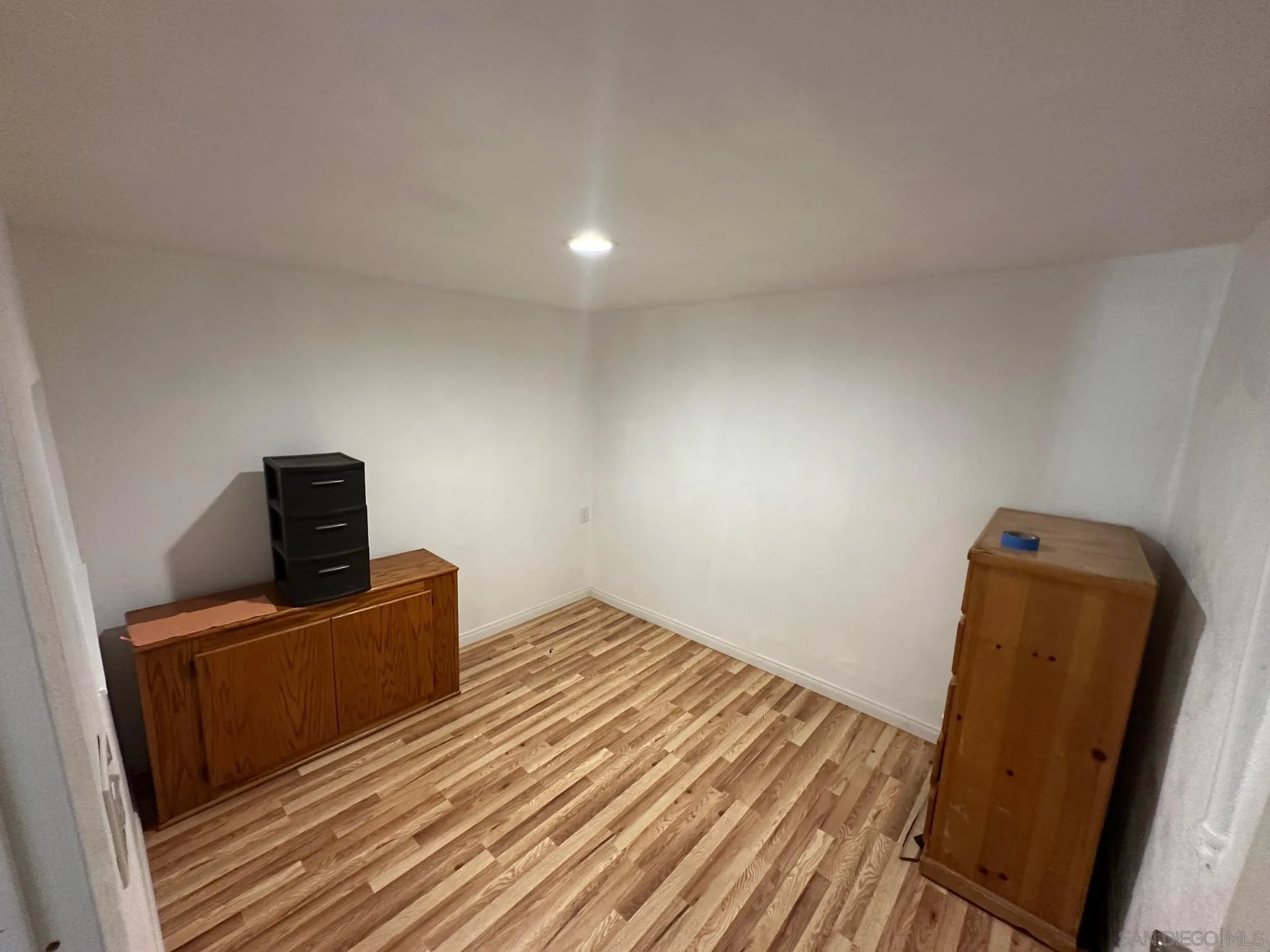 223 South Stage Coach Lane Fallbrook, CA 92028 - Photo 11 of 20 a living room with furniture and a wooden floor
