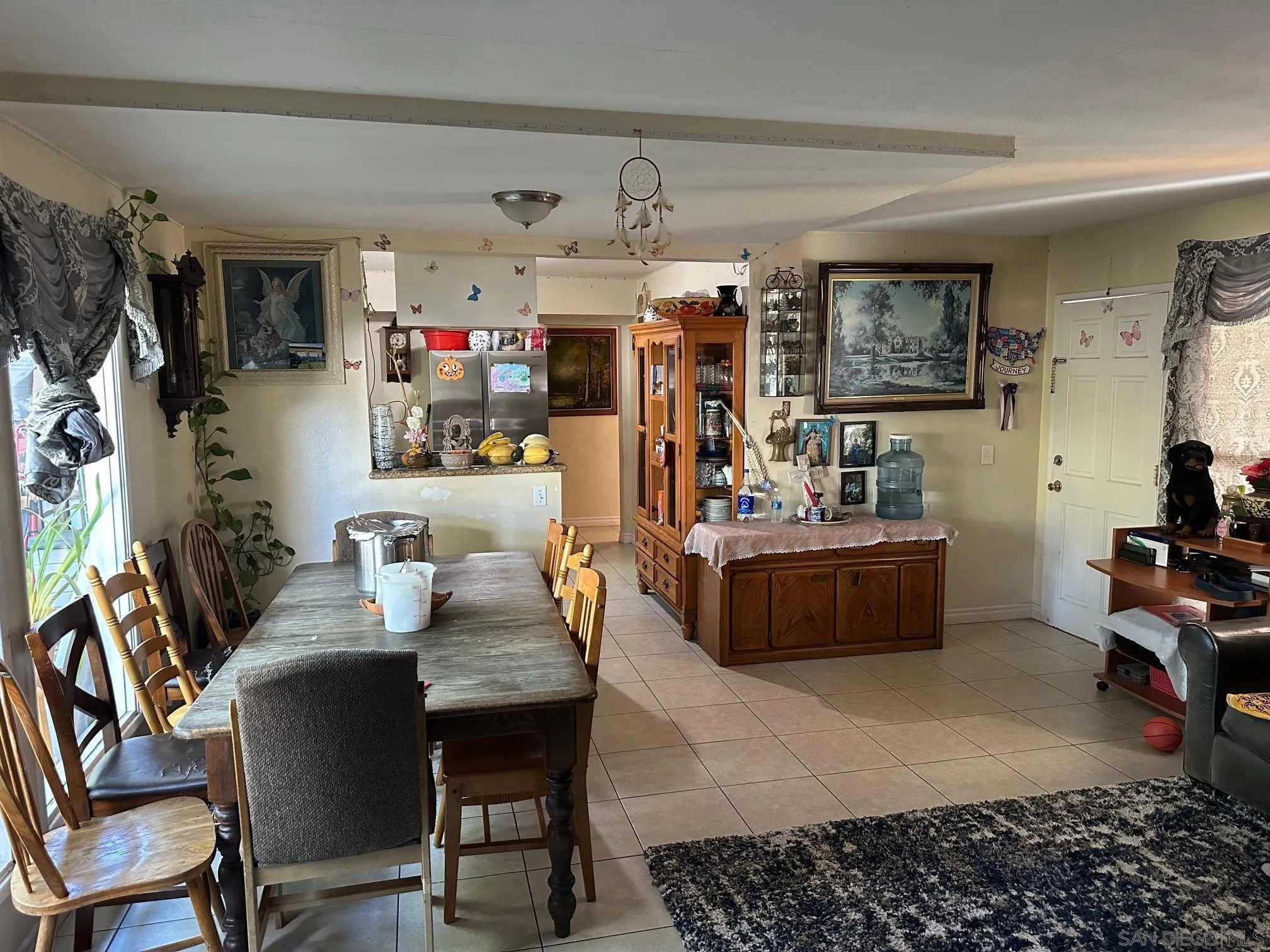223 South Stage Coach Lane Fallbrook, CA 92028 - Photo 7 of 20 a living room with furniture and a flat screen tv