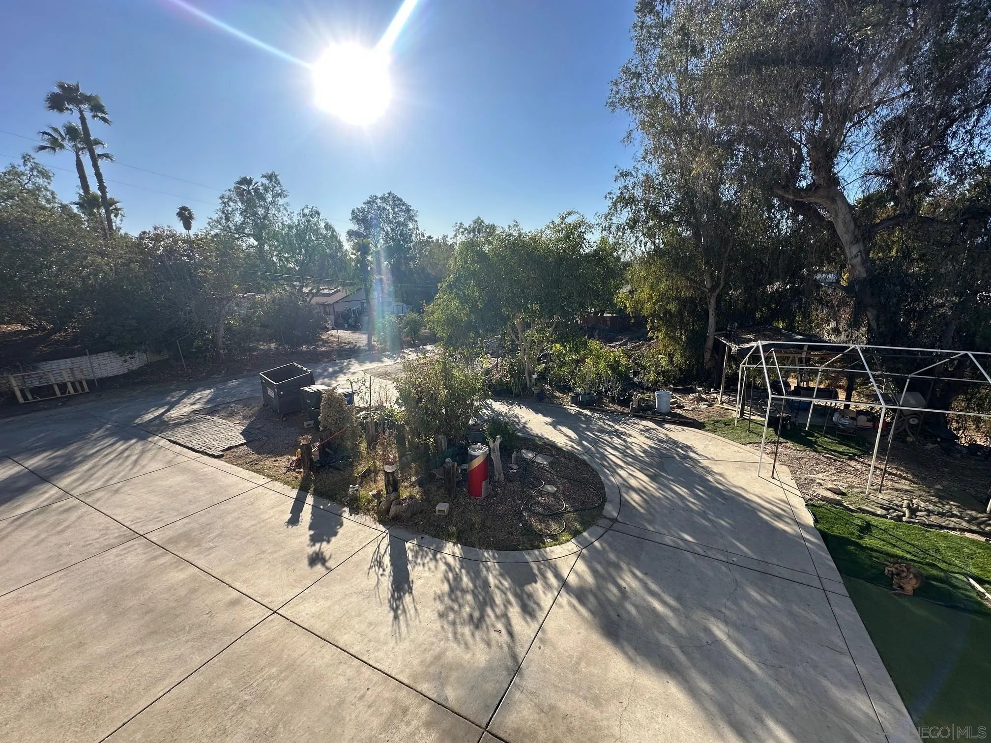 223 South Stage Coach Lane Fallbrook, CA 92028 - Photo 10 of 20 a view of a patio with table and chairs and potted plants
