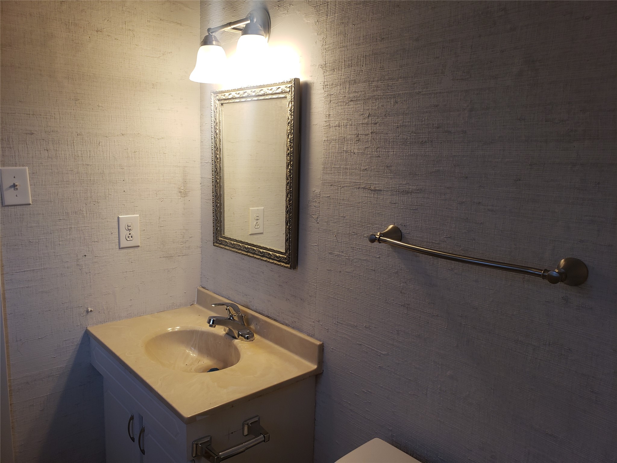 609 Bissonet Lane, Unit B Austin, TX 78752 - Photo 10 of 10 Half bathroom with vanity