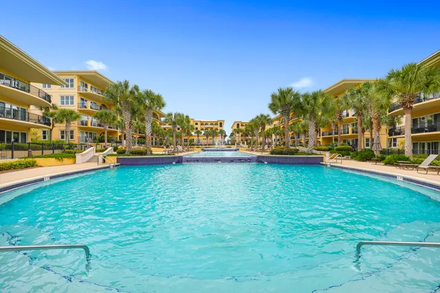 a view of a balcony with an ocean view