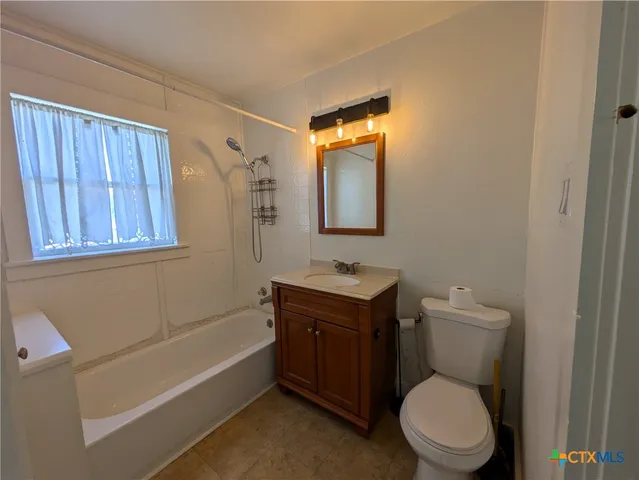 a front view of a house with yard