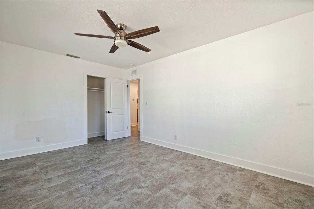 176 175th Avenue East Redington Shores, FL 33708 - Photo 23 of 37 a view of an empty room