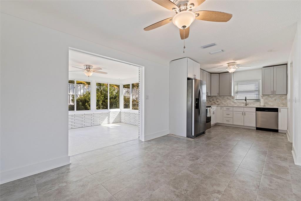 176 175th Avenue East Redington Shores, FL 33708 - Photo 8 of 37 a view of a kitchen with a sink and a window